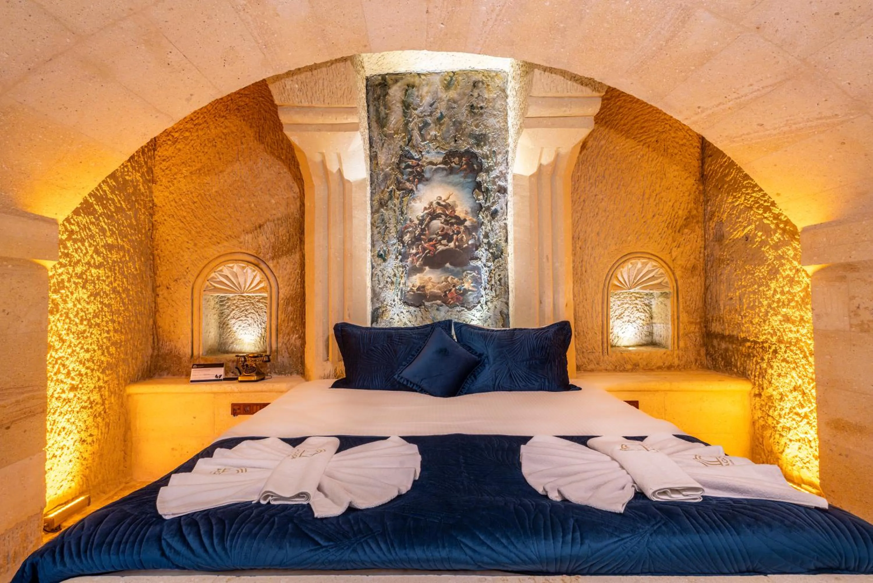 Bed in Lagoon Cave Suites