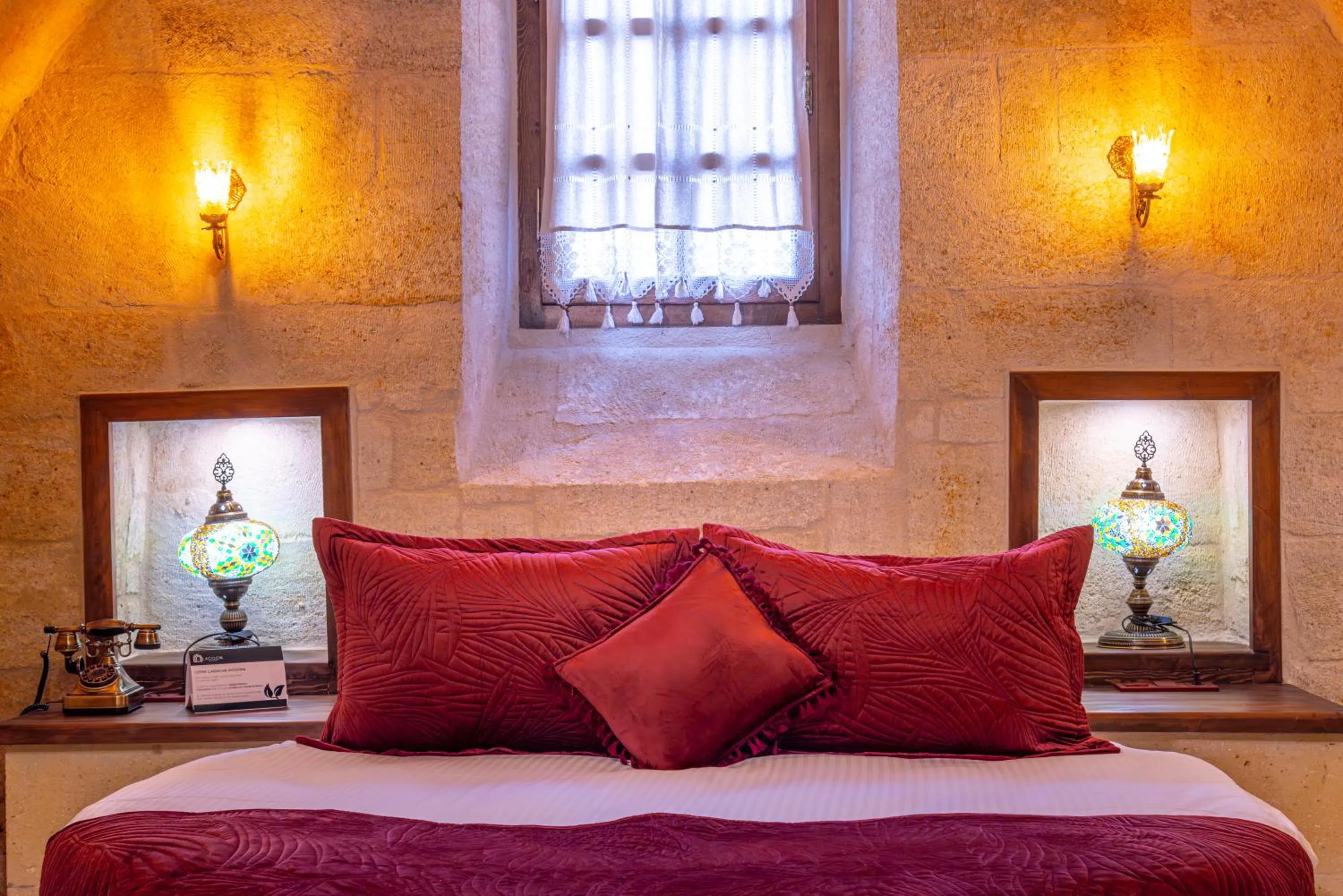 Bed in Lagoon Cave Suites