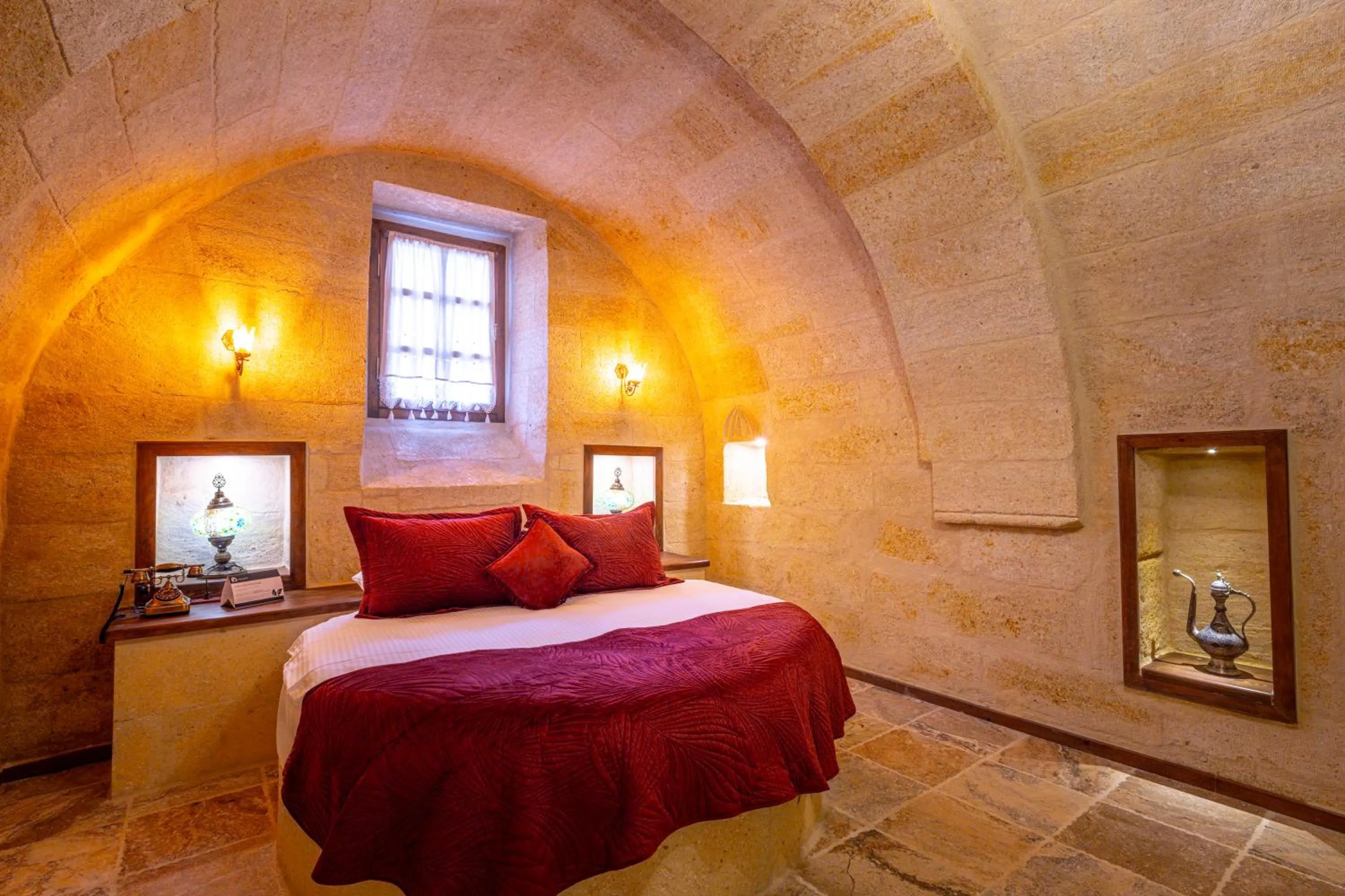 Bed in Lagoon Cave Suites