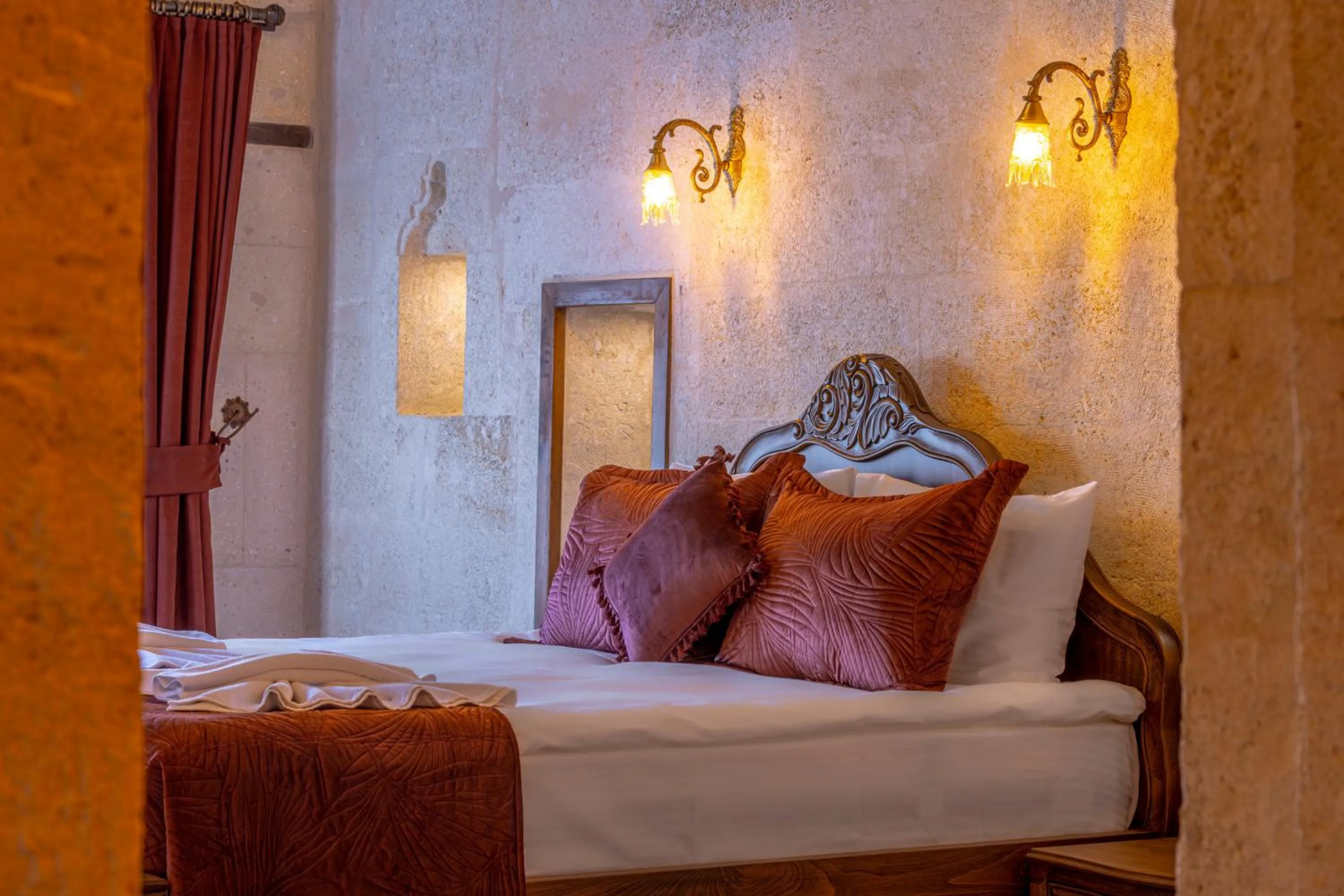 Bed in Lagoon Cave Suites