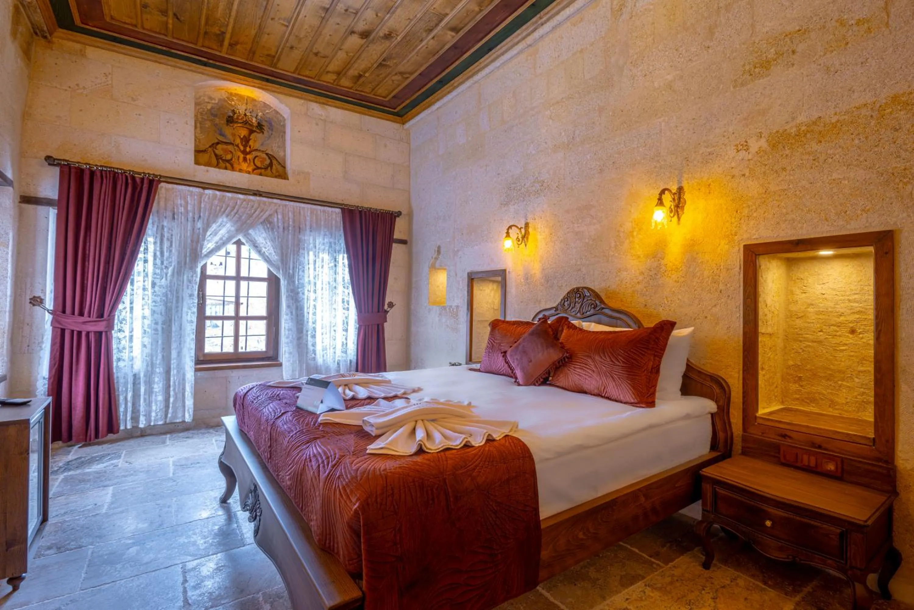 Bed in Lagoon Cave Suites