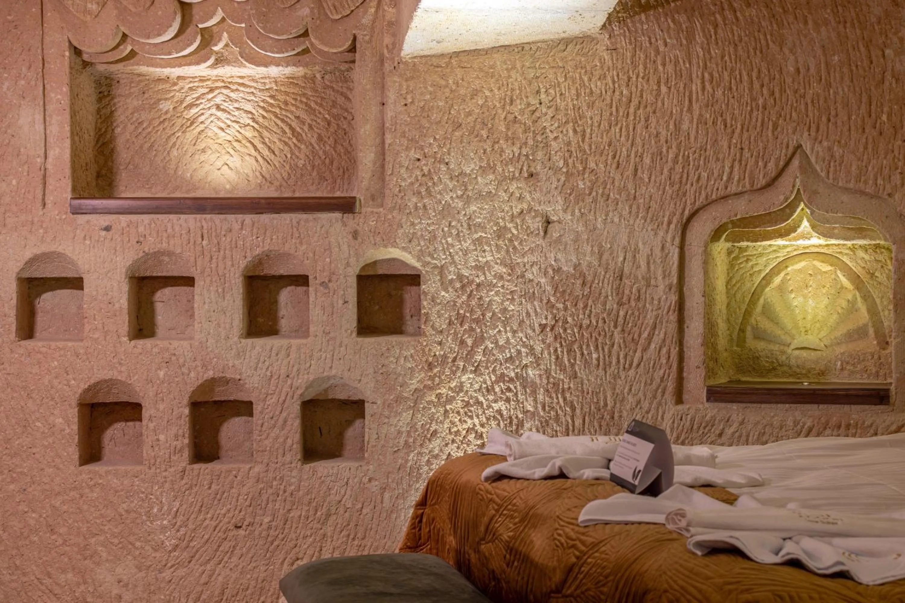 Bed in Lagoon Cave Suites