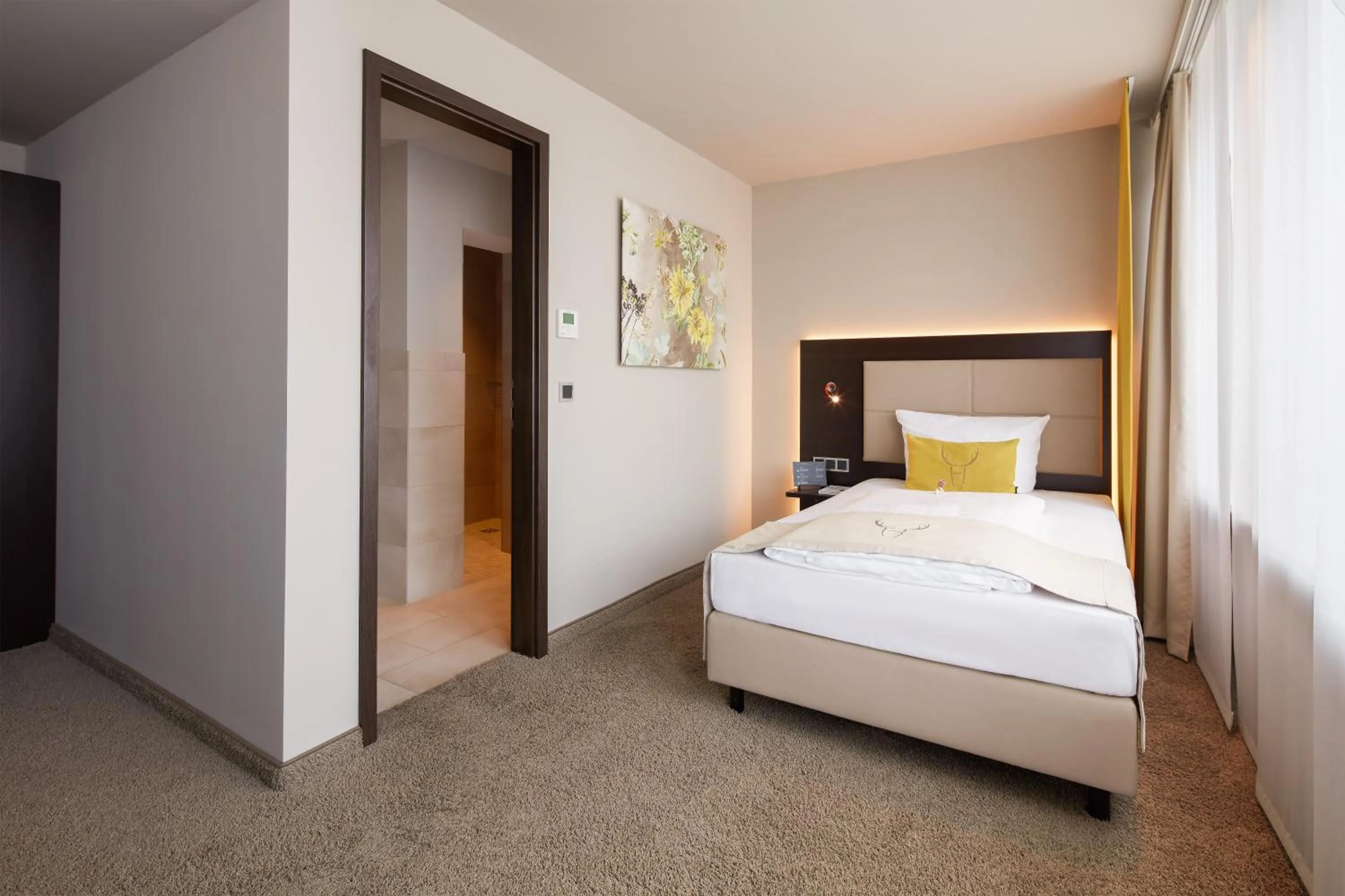 Photo of the whole room, Bed in Hotel Platzhirsch