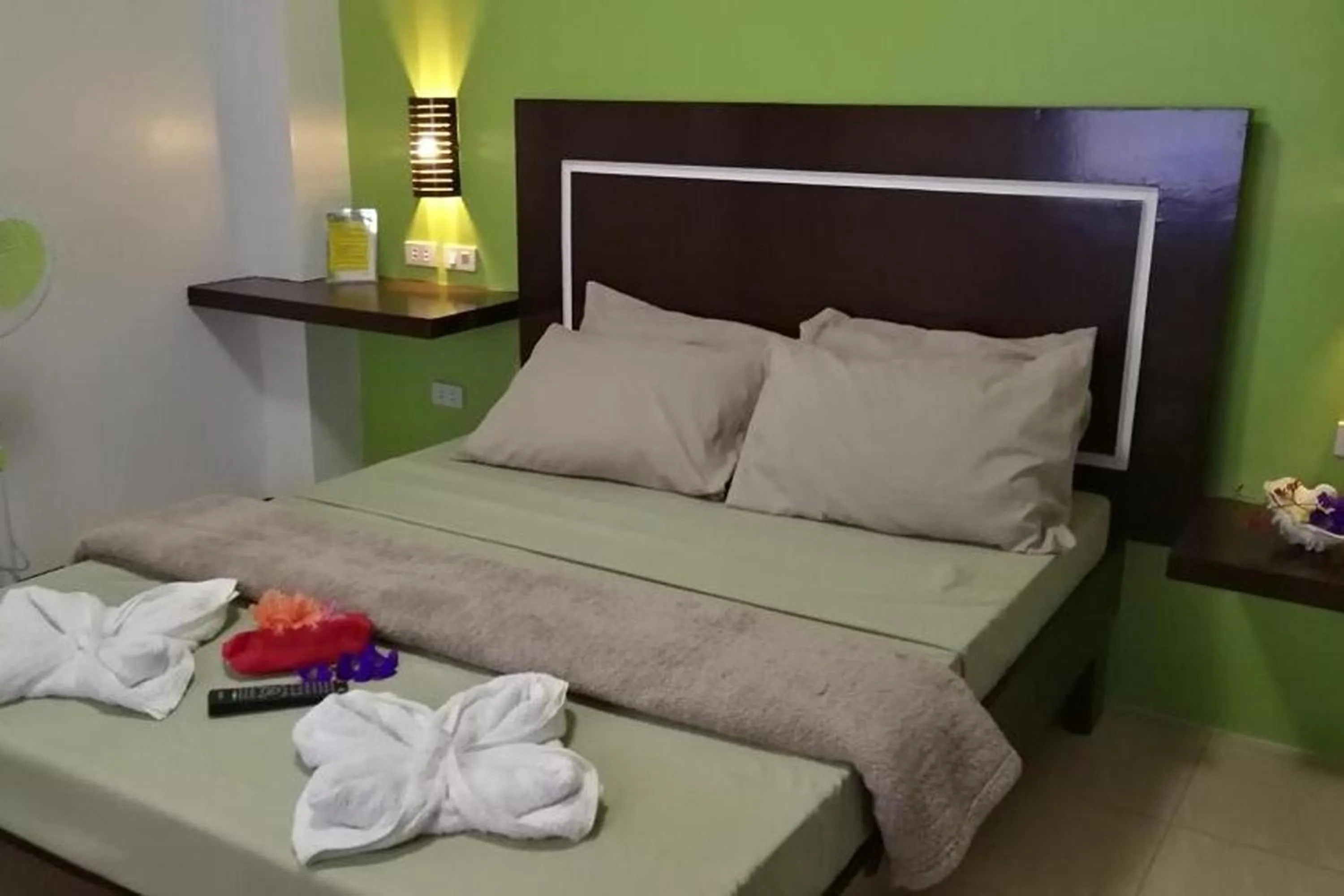 Bed in Bellevue Resort Puerto Galera