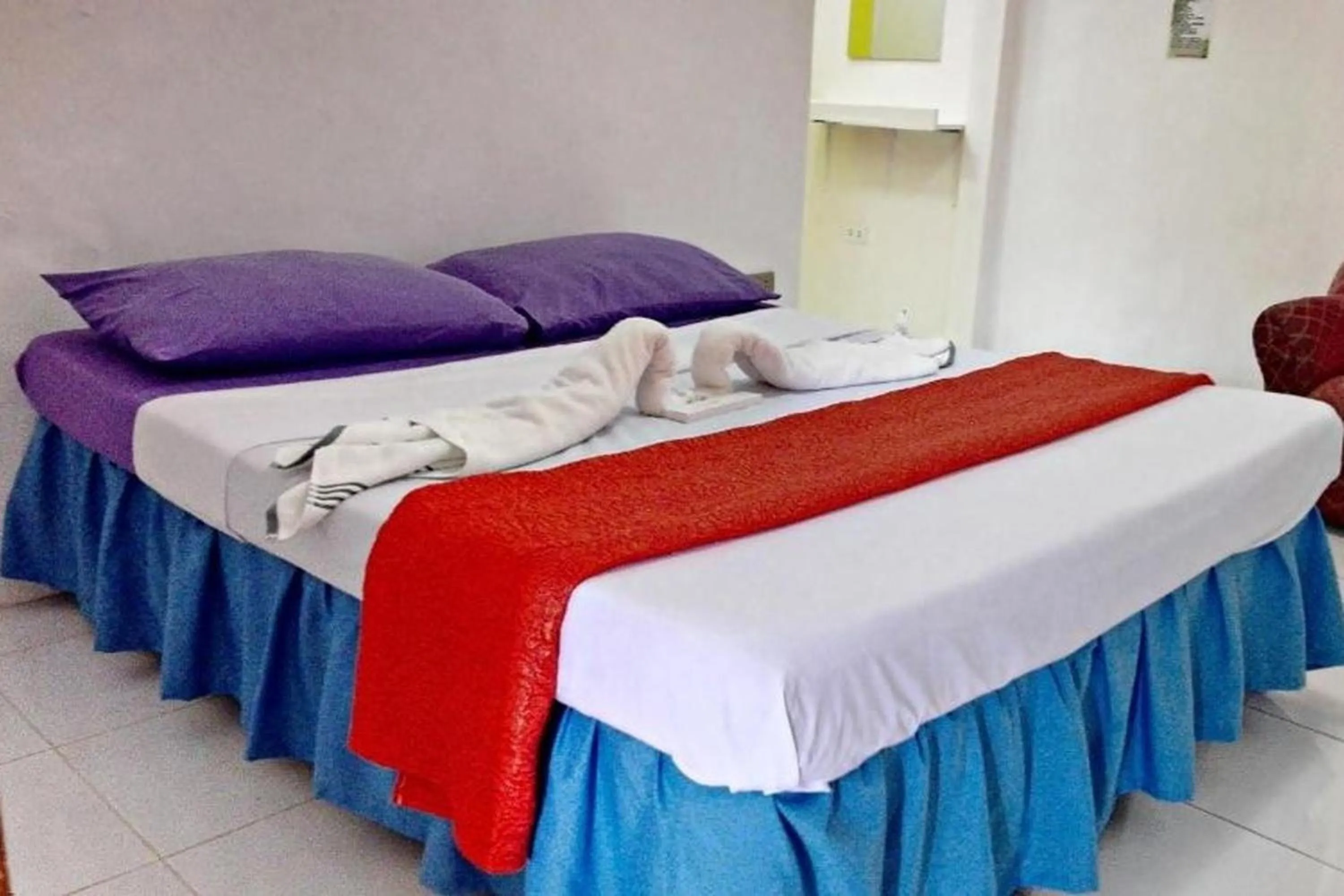 Bed in Bellevue Resort Puerto Galera