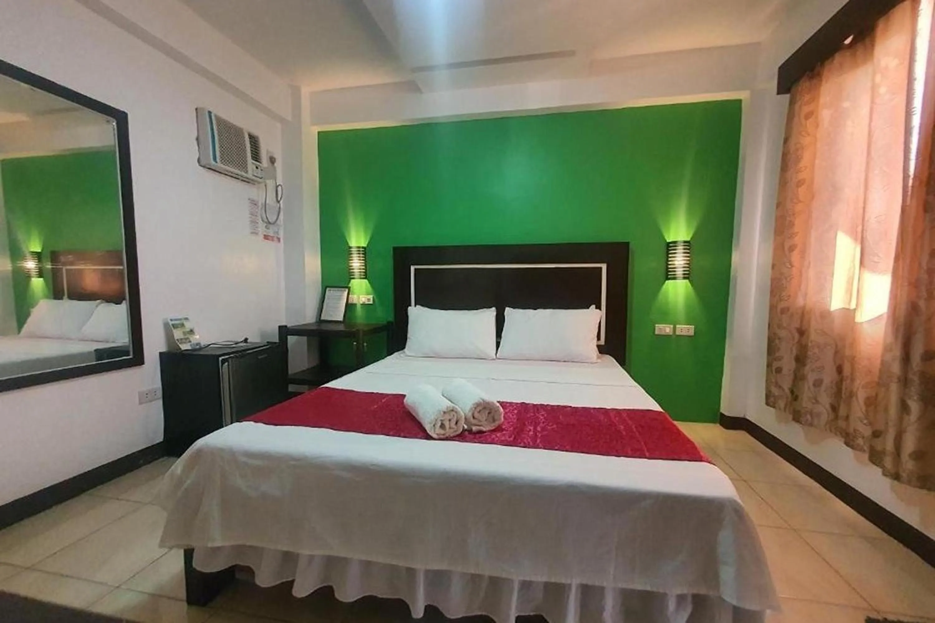 Bed in Bellevue Resort Puerto Galera