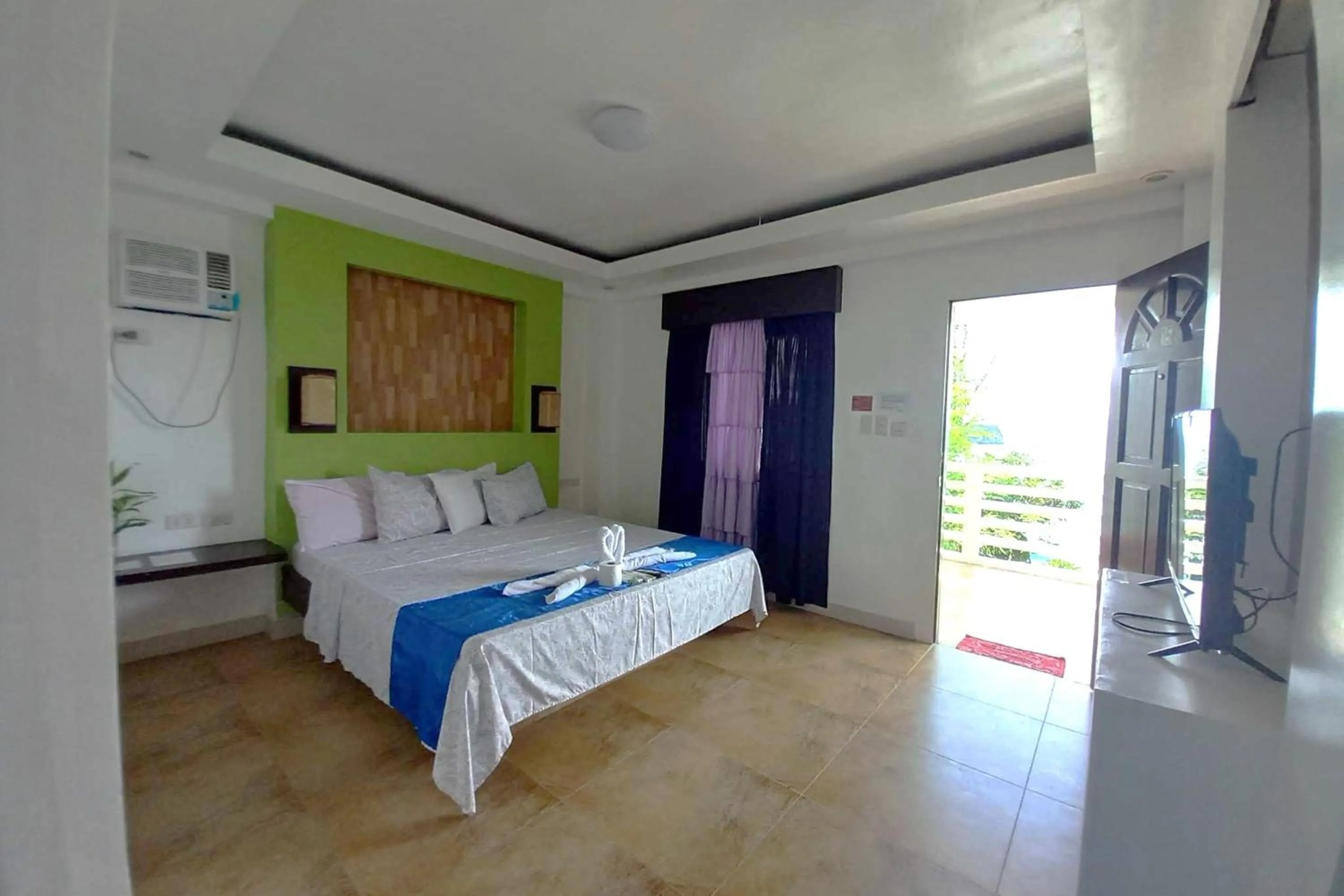 Bed in Bellevue Resort Puerto Galera