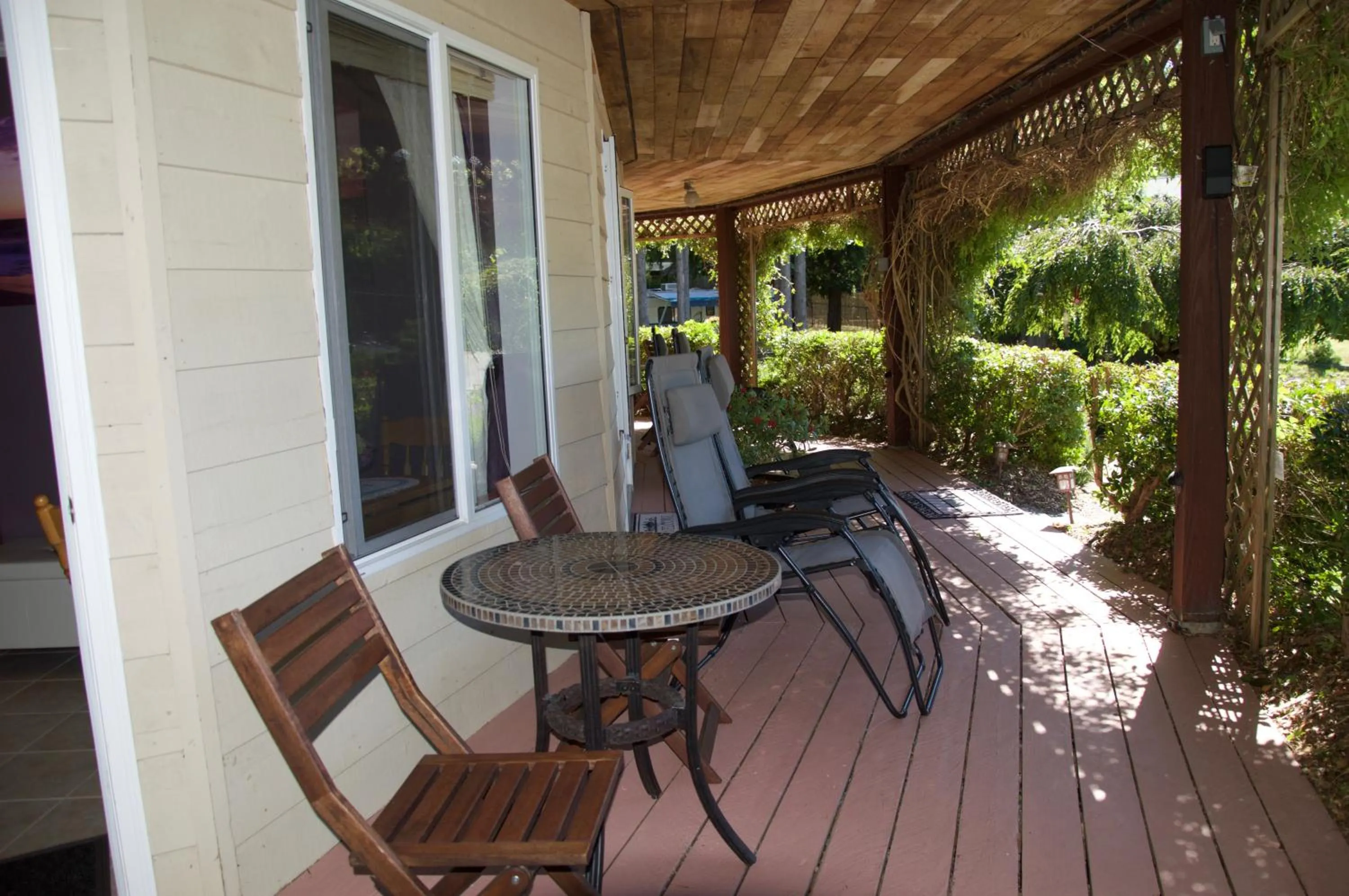 Patio in Enchanter Ocean View Suites