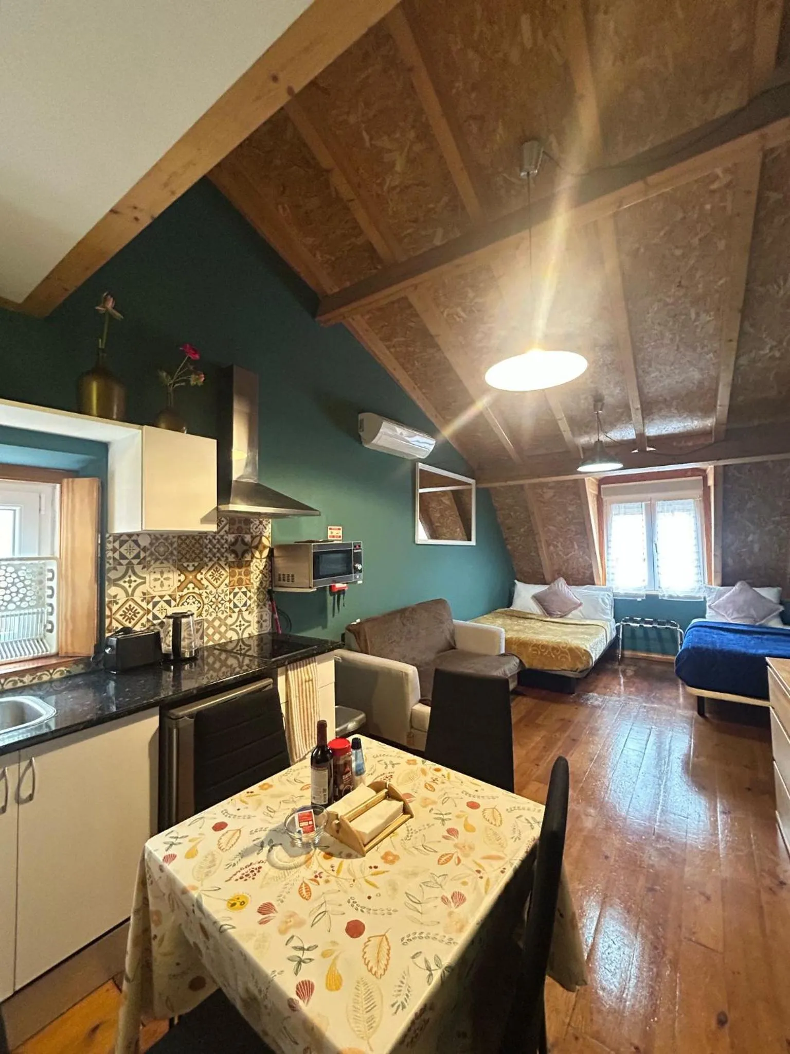 Bed in Sao Jorge Apartments & Suites