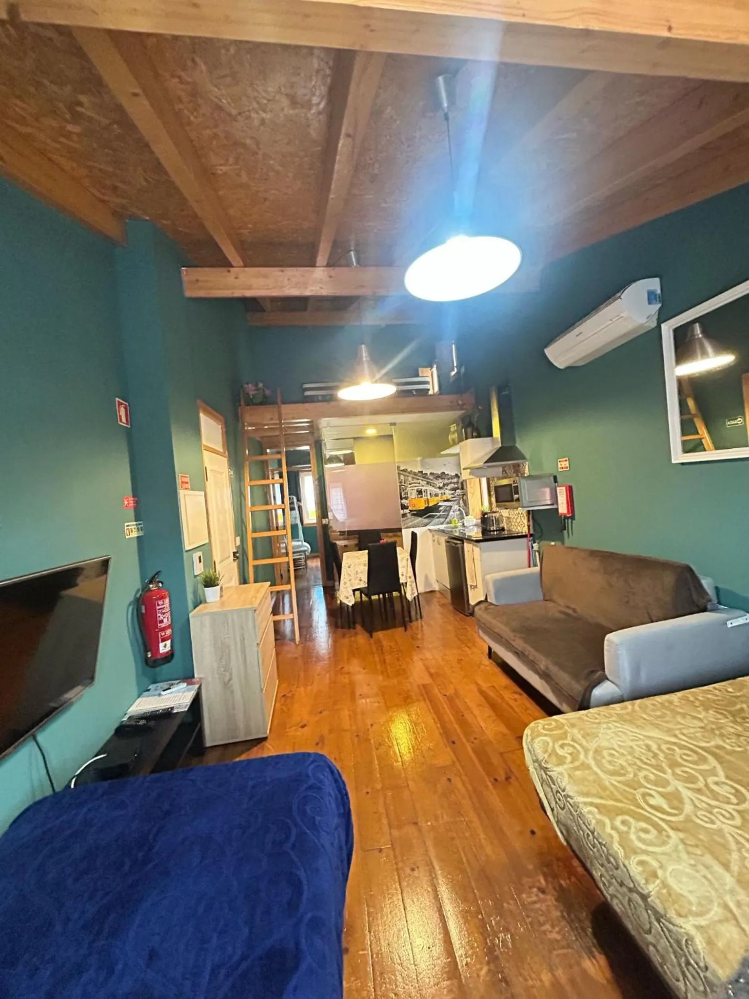 Bed in Sao Jorge Apartments & Suites