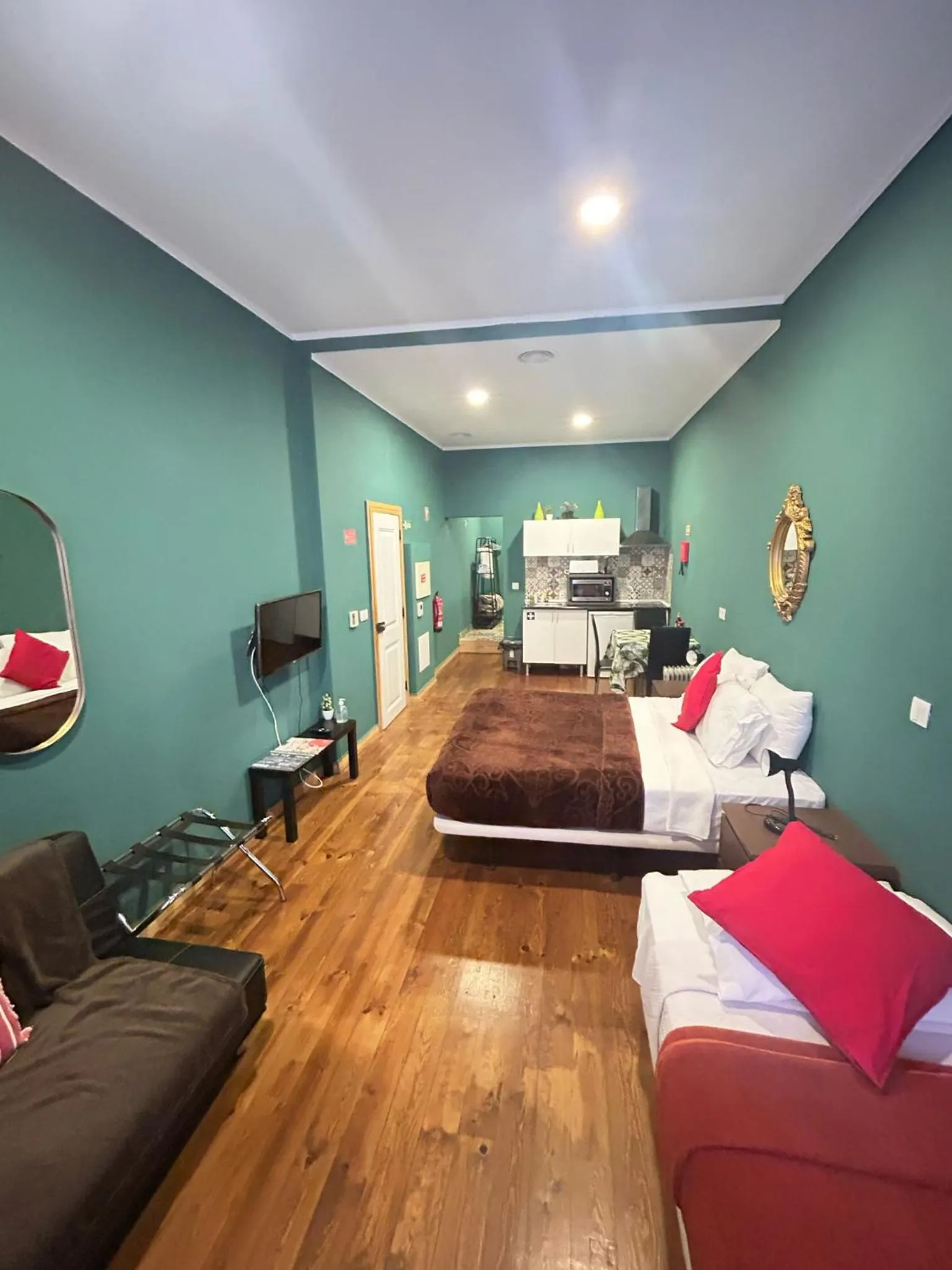 Bed in Sao Jorge Apartments & Suites