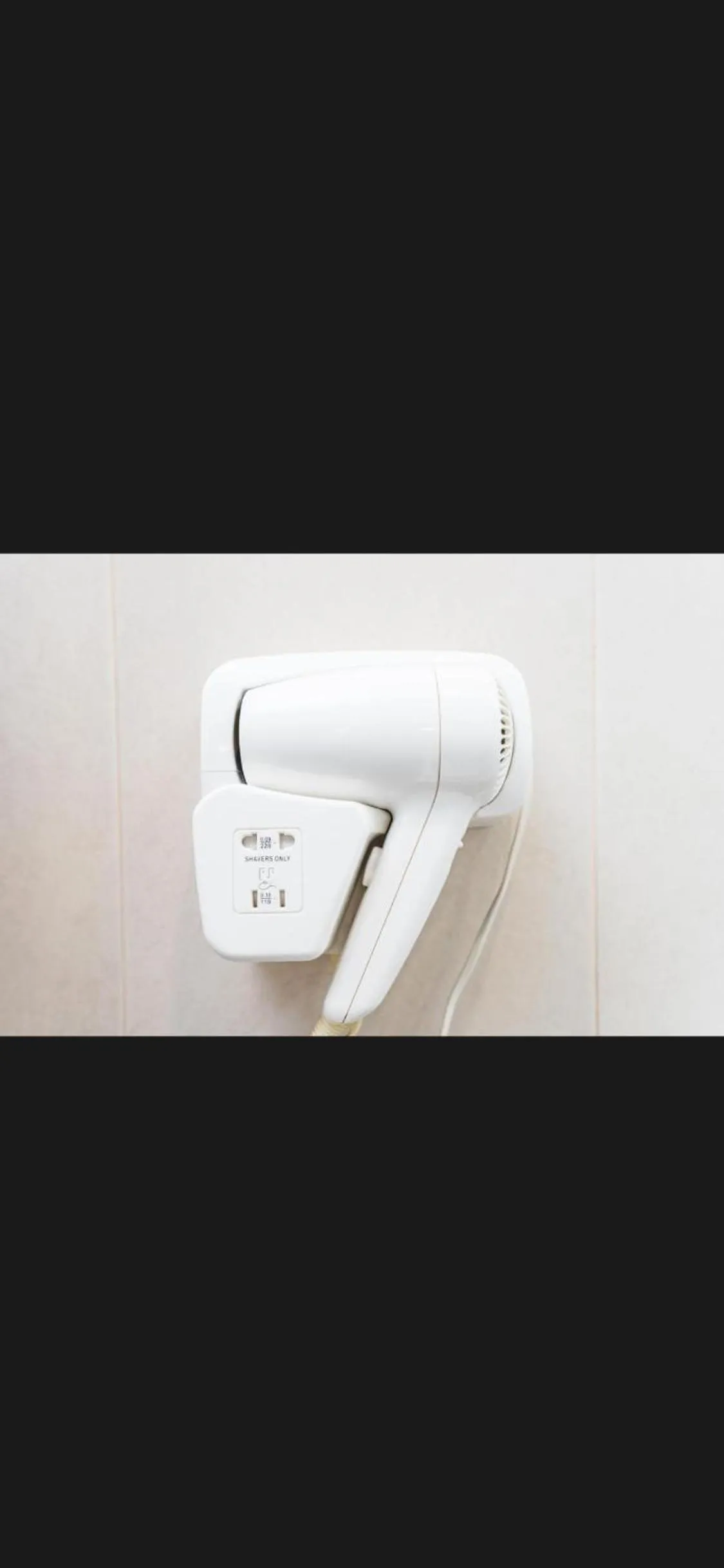 hair dryier in Sao Jorge Apartments & Suites