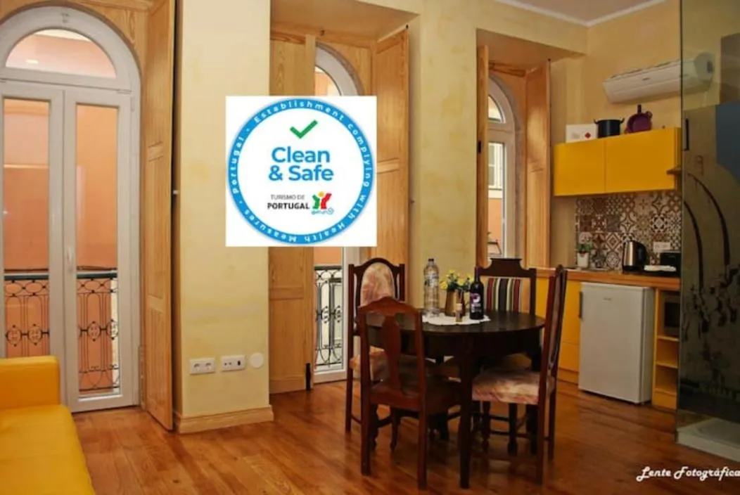 Kitchen or kitchenette in Sao Jorge Apartments & Suites