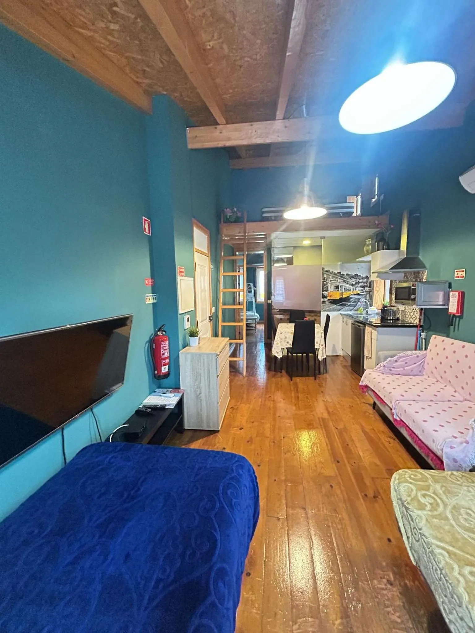 Bed in Sao Jorge Apartments & Suites