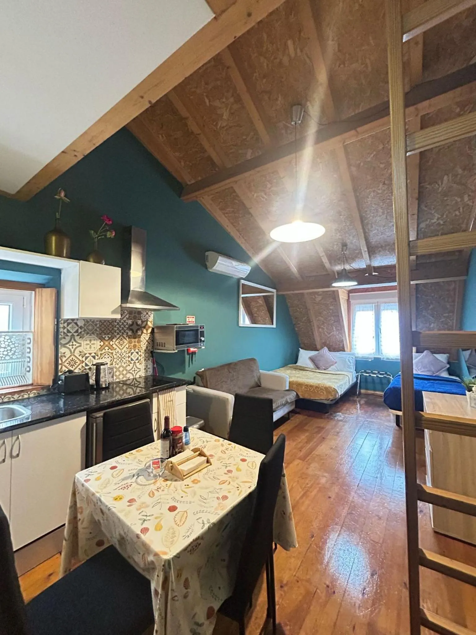 Kitchen or kitchenette, Bed in Sao Jorge Apartments & Suites