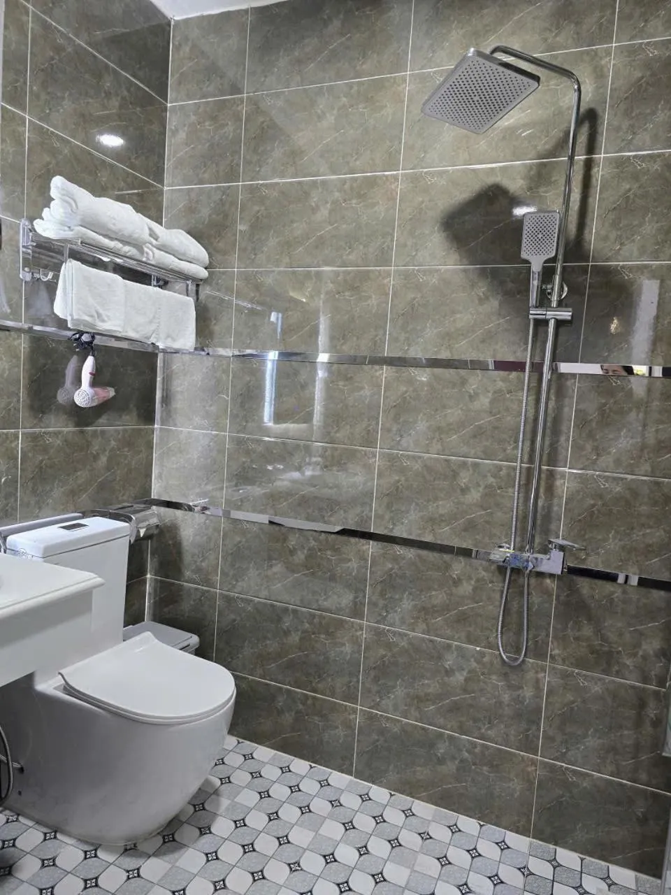 Toilet in Cozy 86 Homestay
