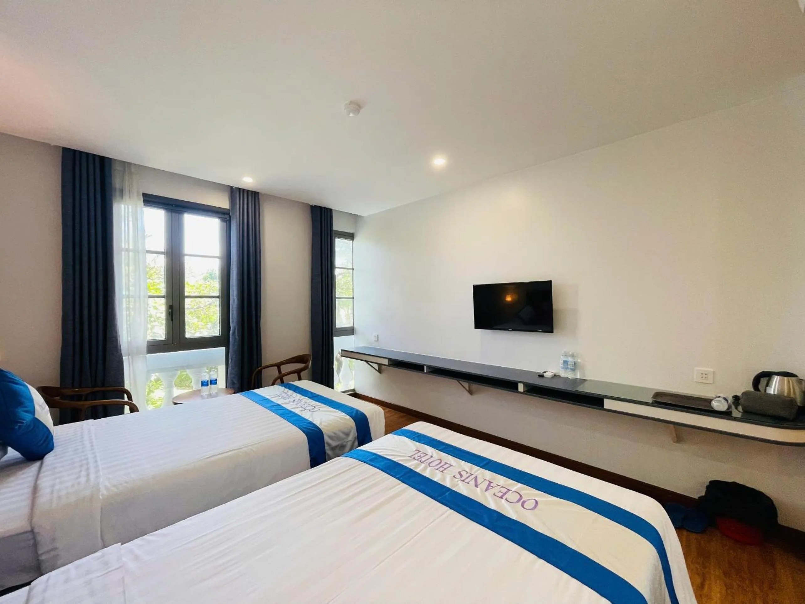 Bed in Oceanis Hotel