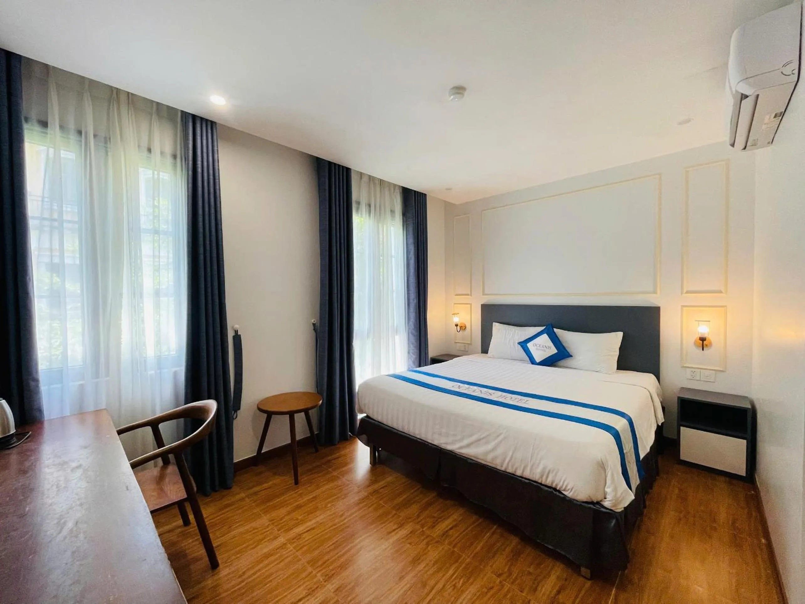 Bed in Oceanis Hotel