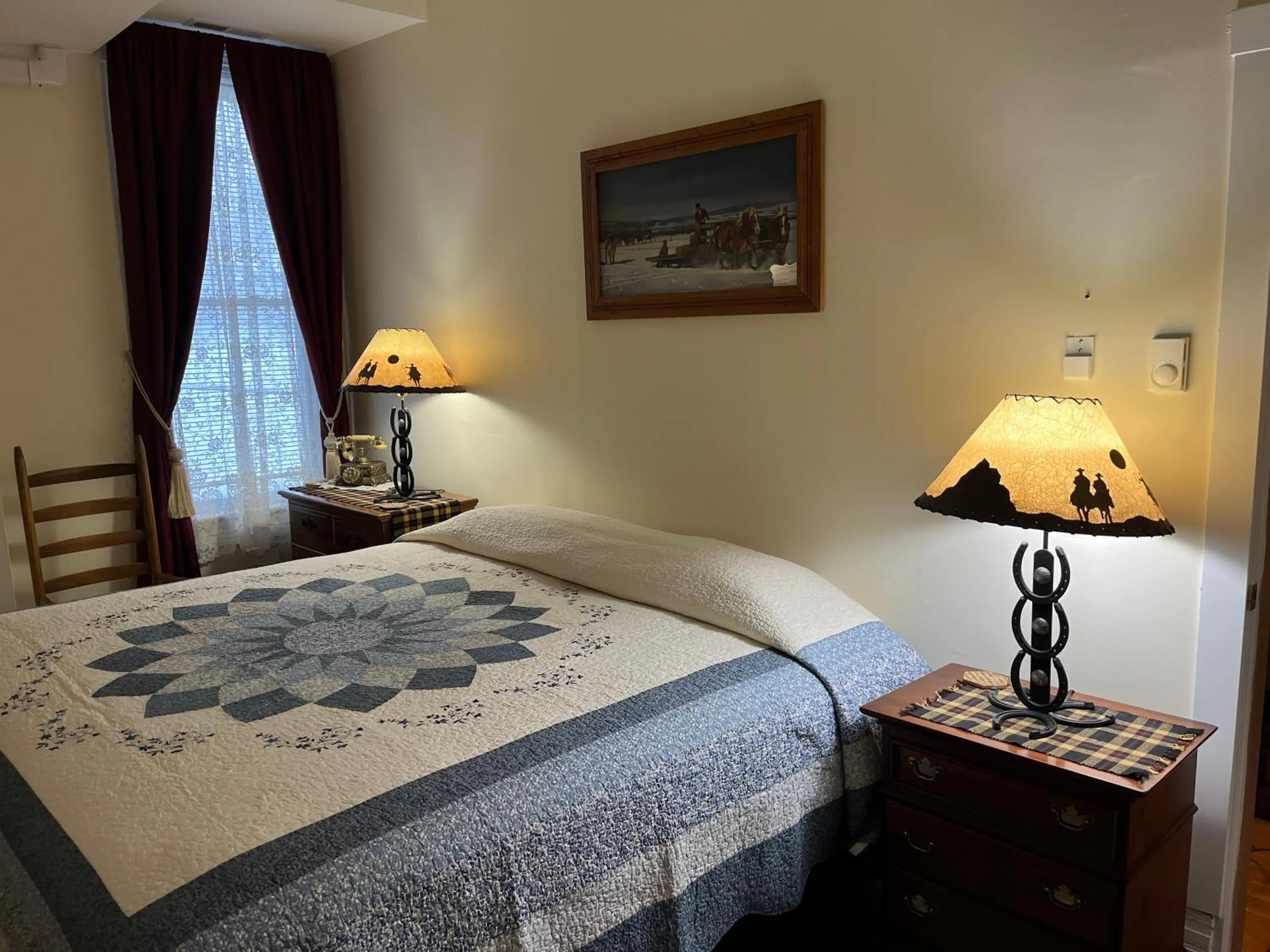 Bed in Historic Capitol Hotel Vacation Suites Downtown