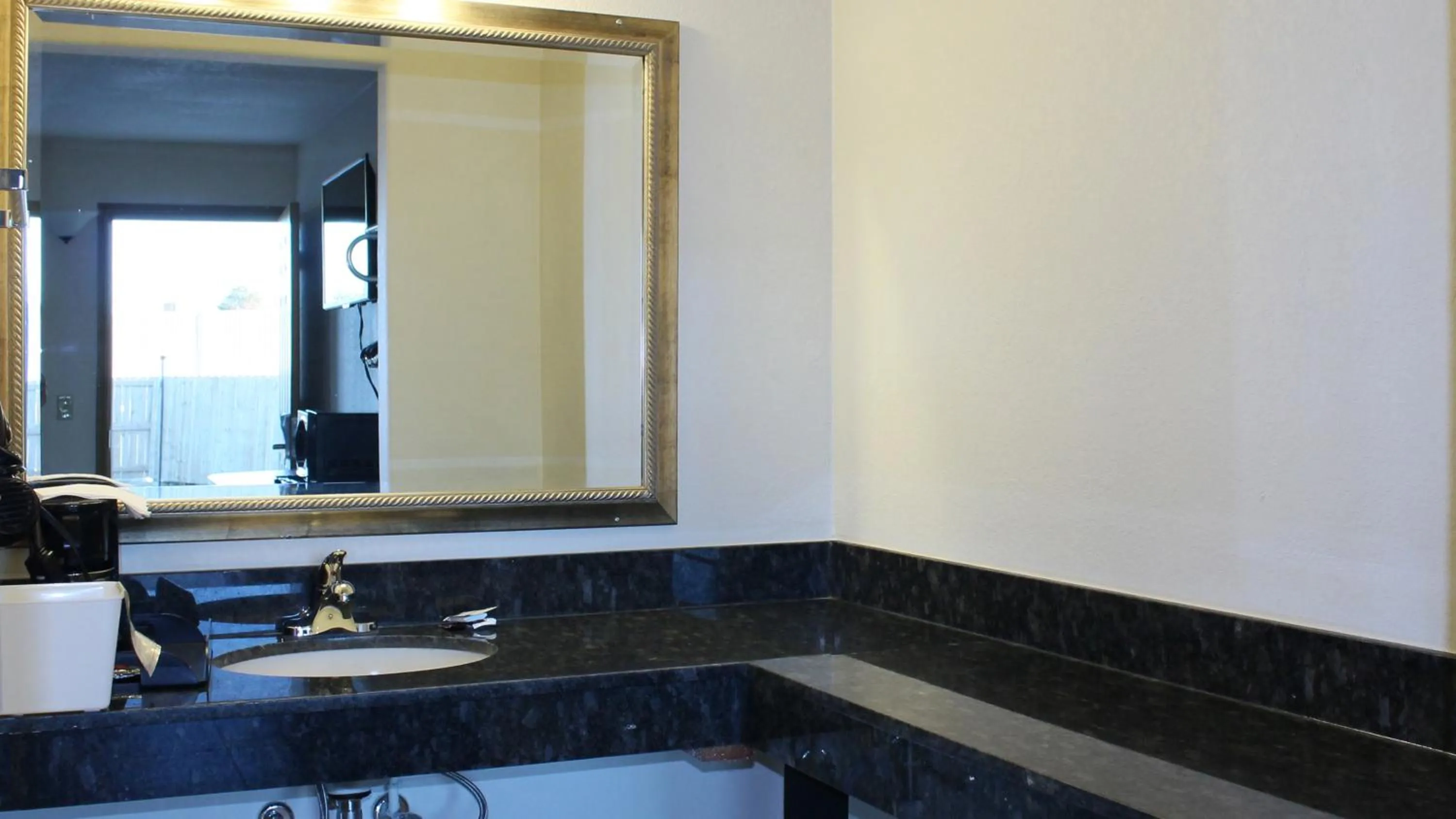 Bathroom in Royal Inn & Suites