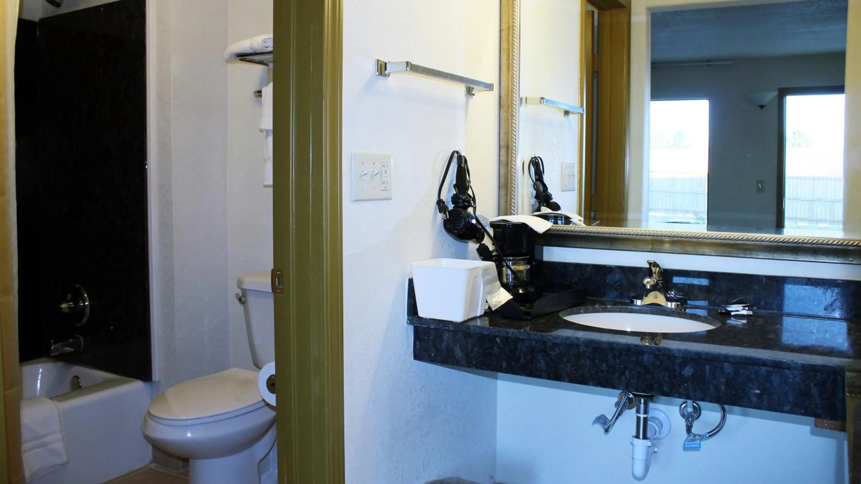 Bathroom in Royal Inn & Suites