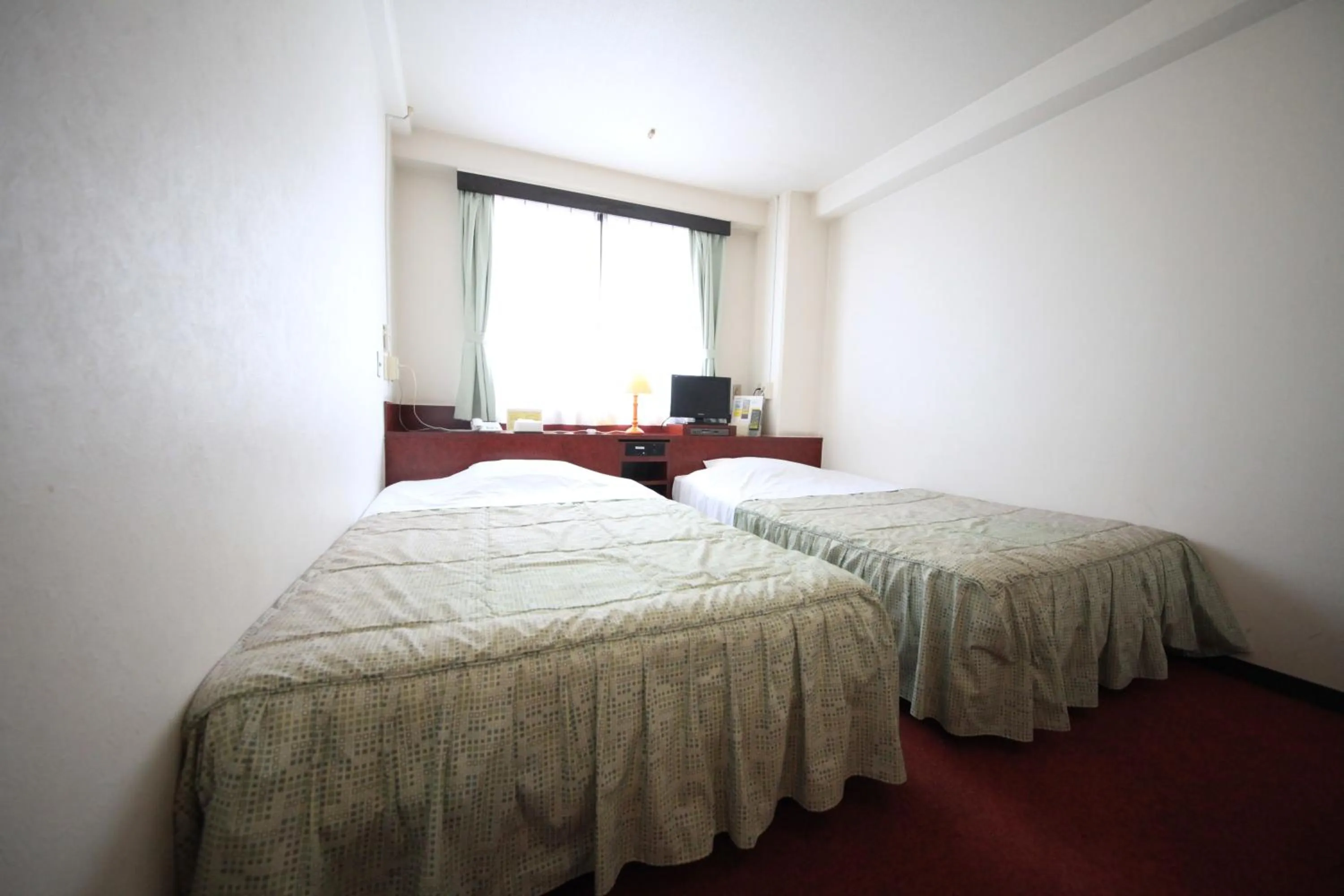 Bed in Kisyaba Hotel