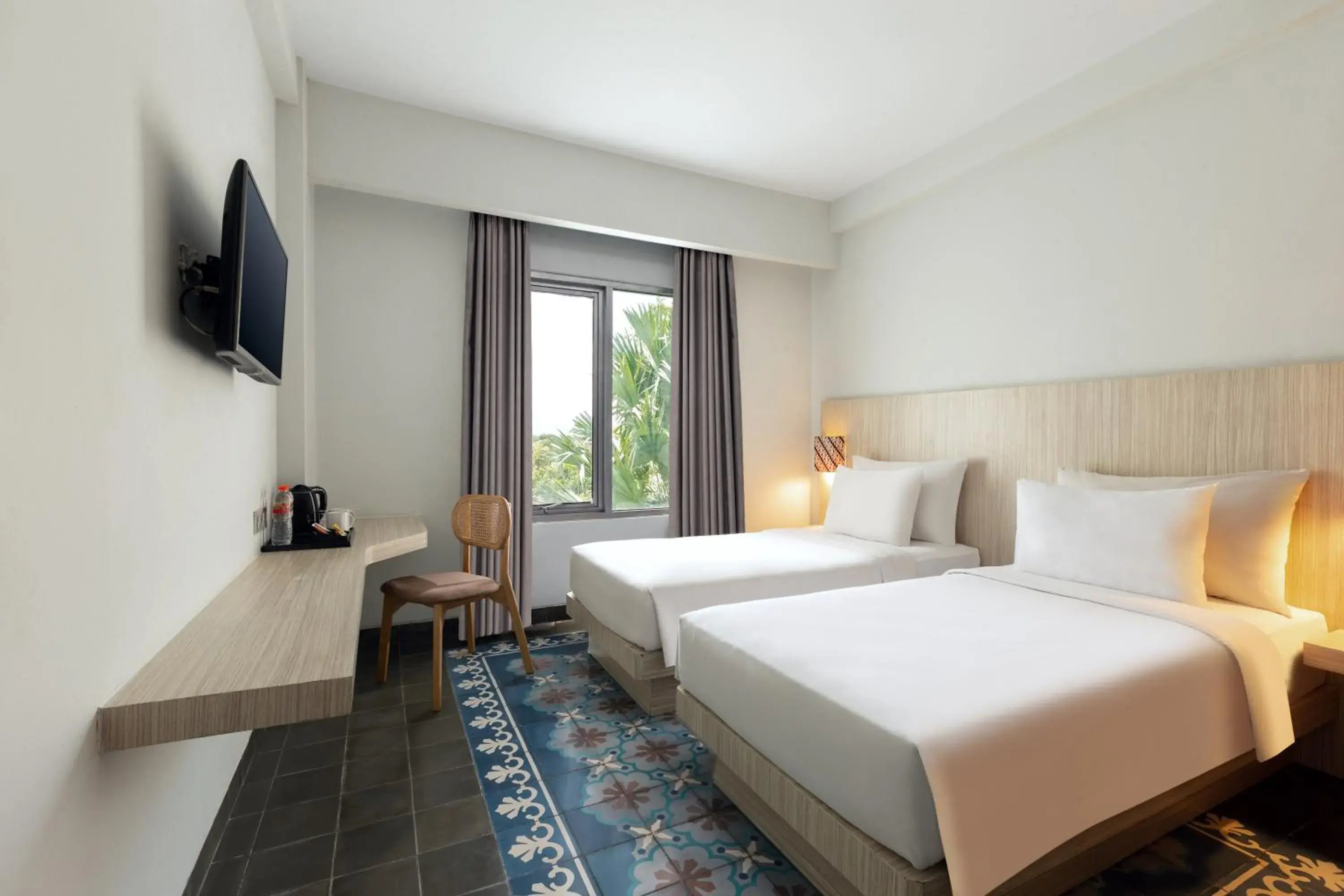Bed in Burza Hotel Yogyakarta