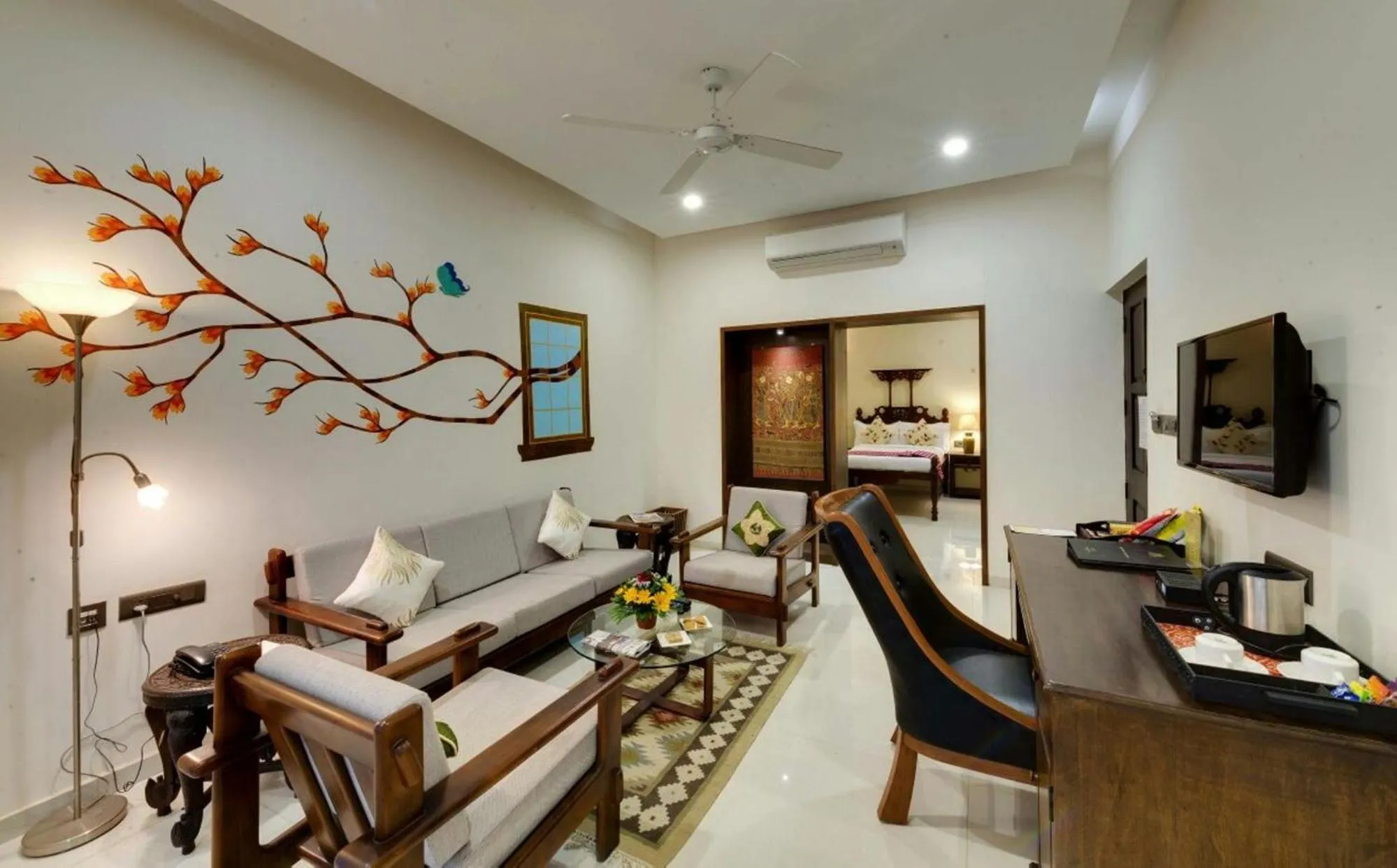 Bed in WelcomHeritage Mani Mansion