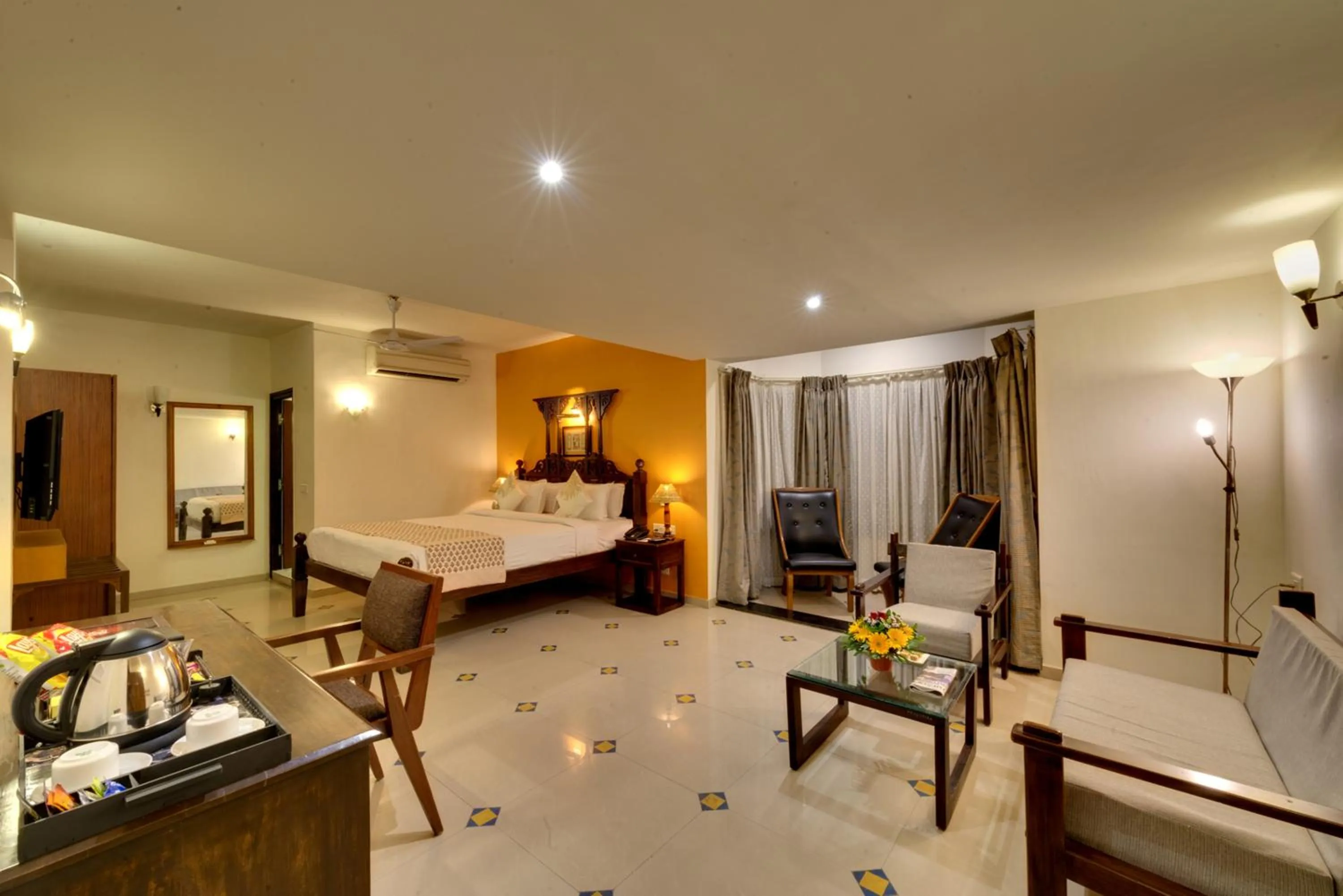 Bed in WelcomHeritage Mani Mansion