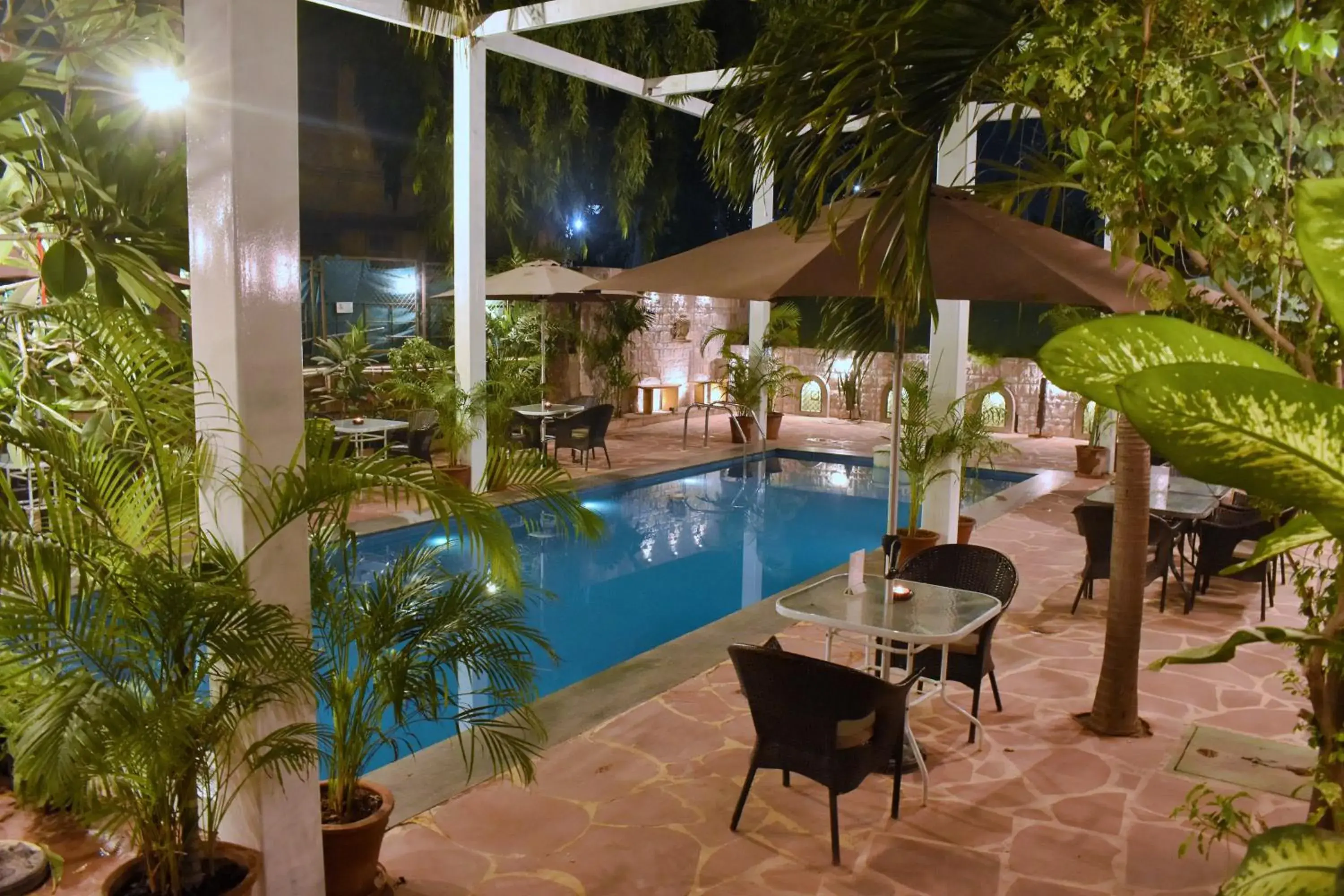 Pool view in WelcomHeritage Mani Mansion Pool view in WelcomHeritage Mani Mansion