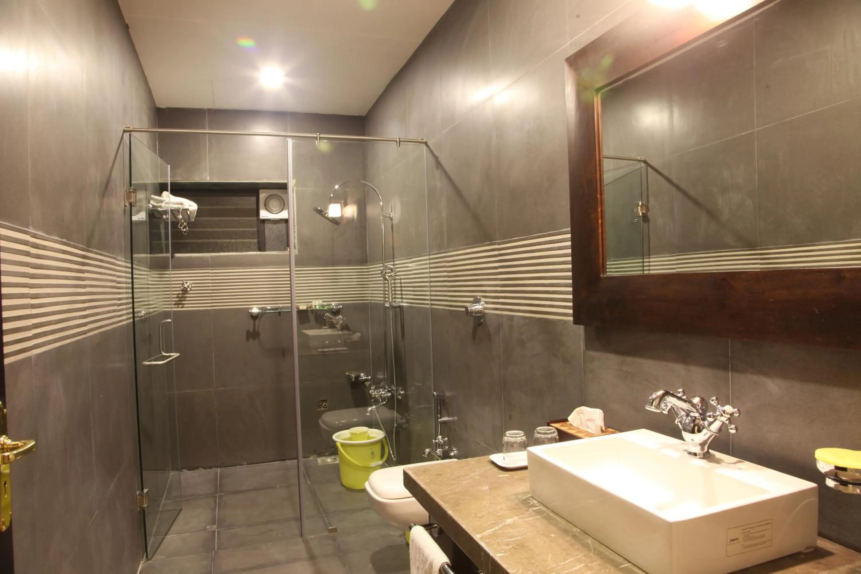 Bathroom in WelcomHeritage Mani Mansion