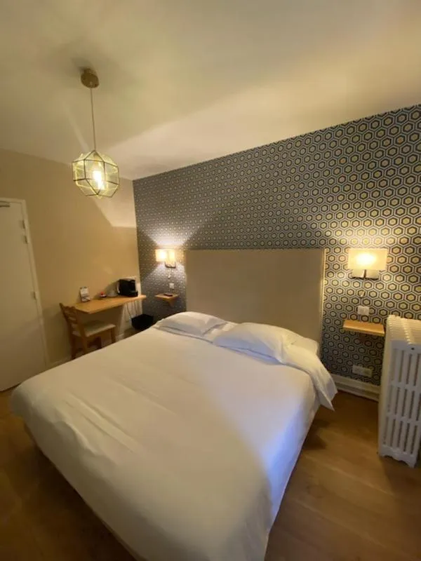 Bed in Hotel Le Central