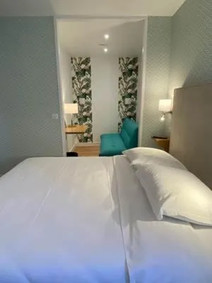 Bed in Hotel Le Central