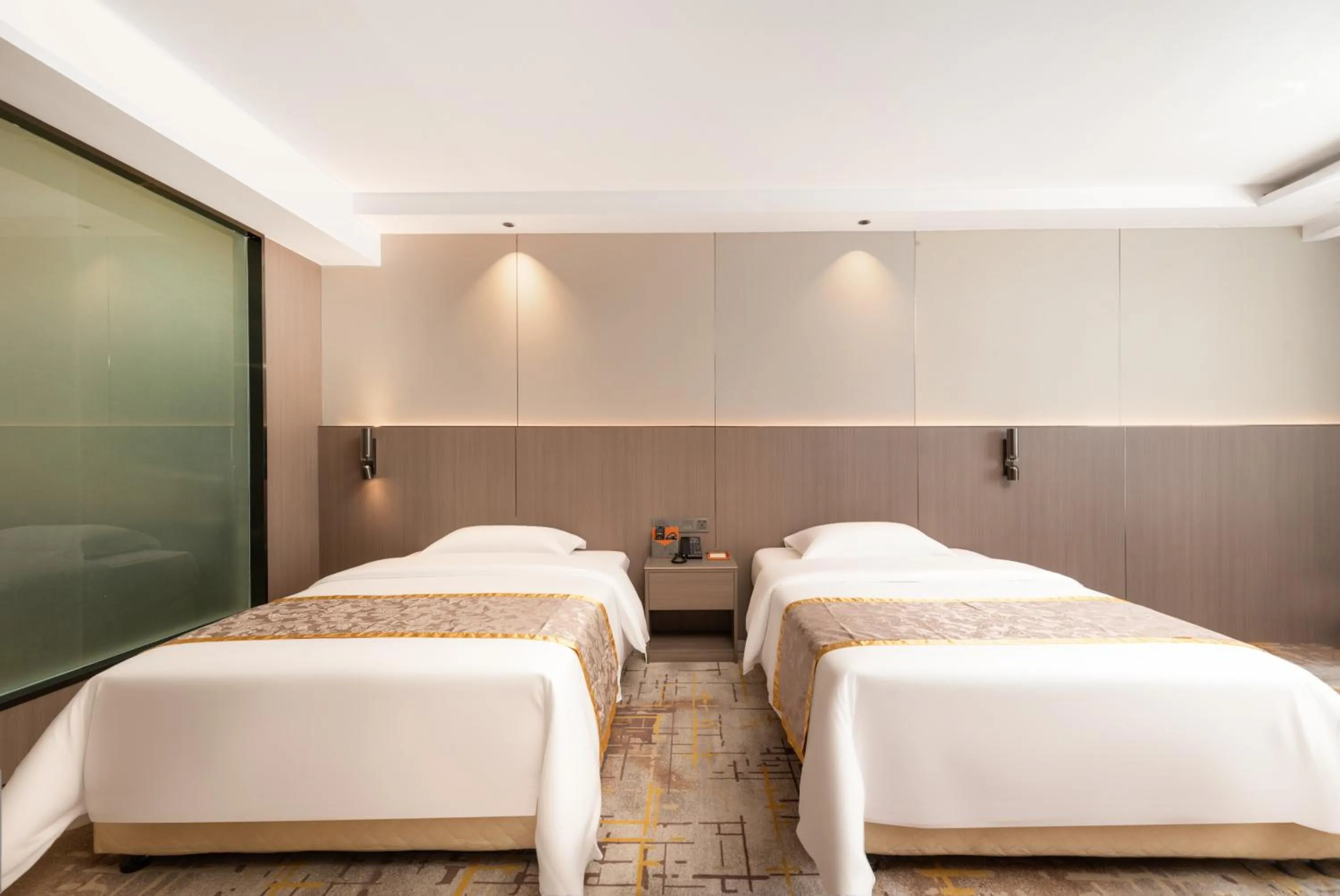 Bed in Elong Me Hotel