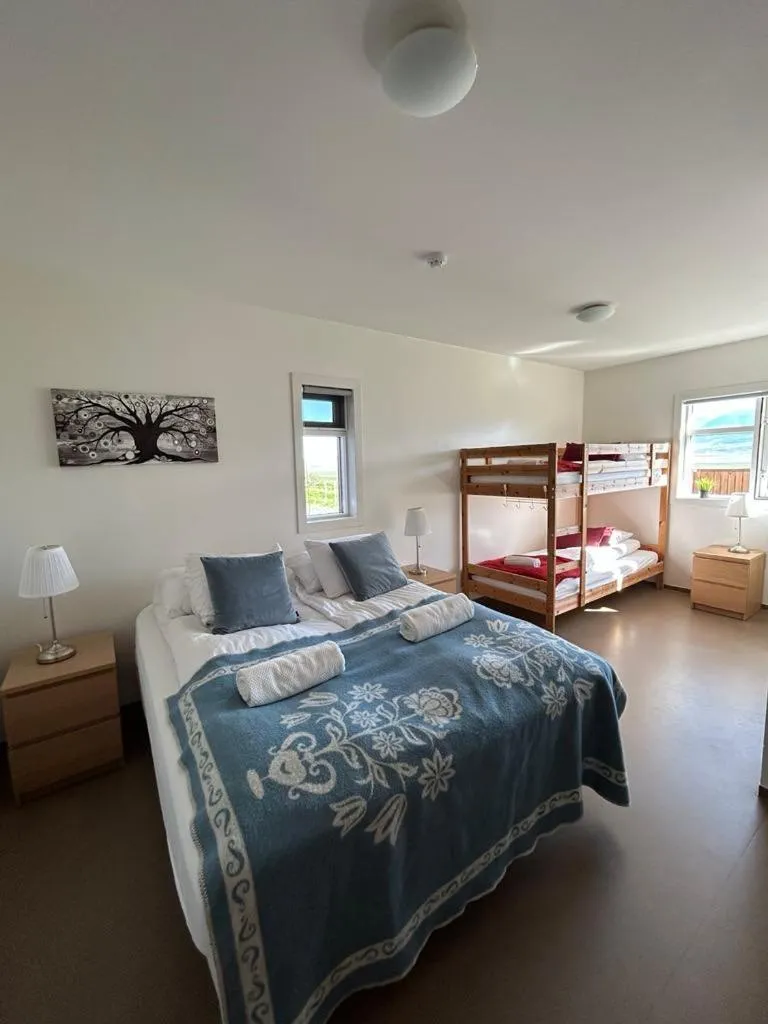 Bed in Syðra-Skörðugil Guesthouse