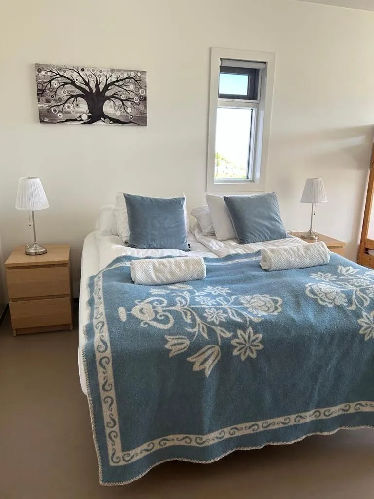 Bed in Syðra-Skörðugil Guesthouse