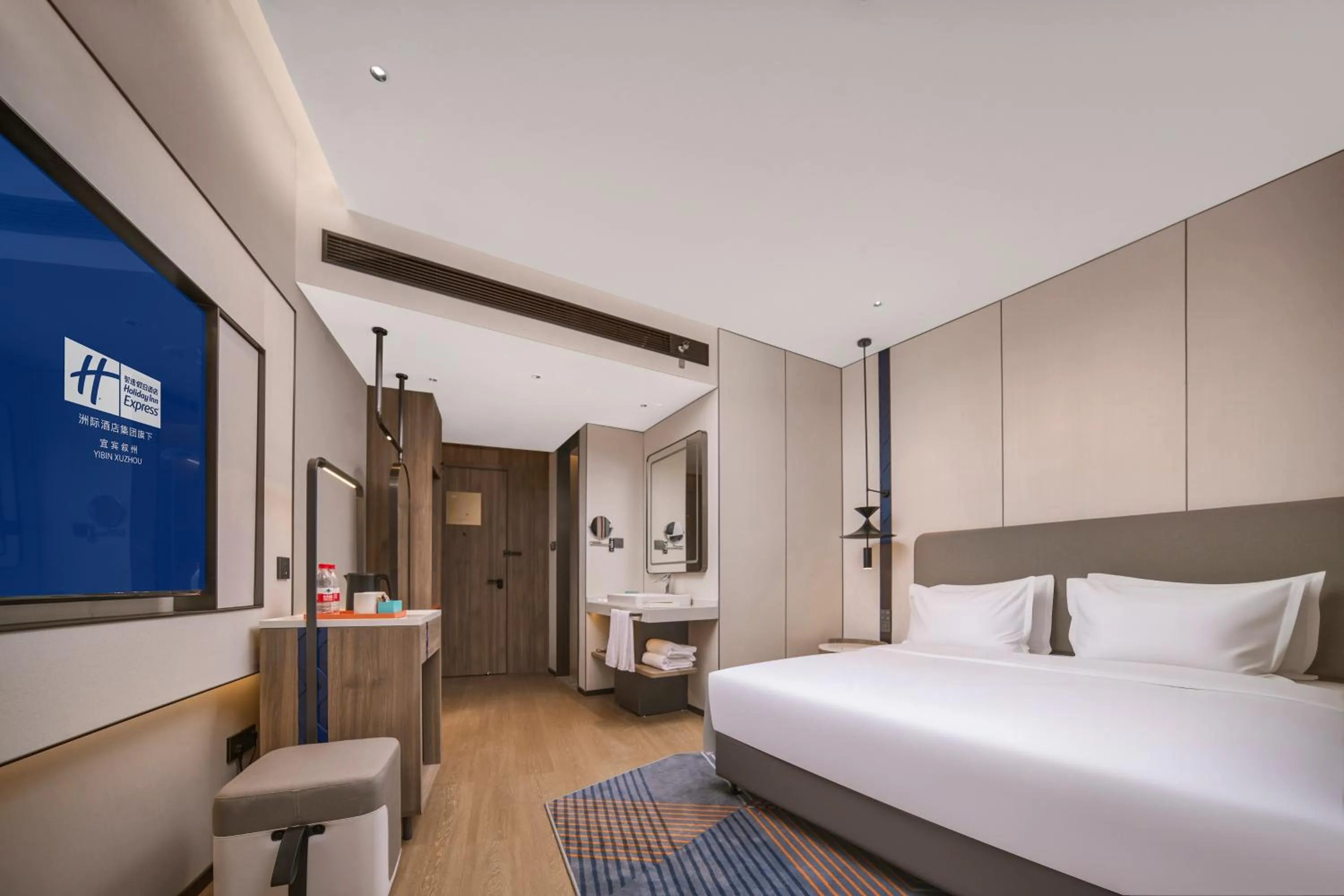 Bed in Holiday Inn Express Yibin Xuzhou by IHG