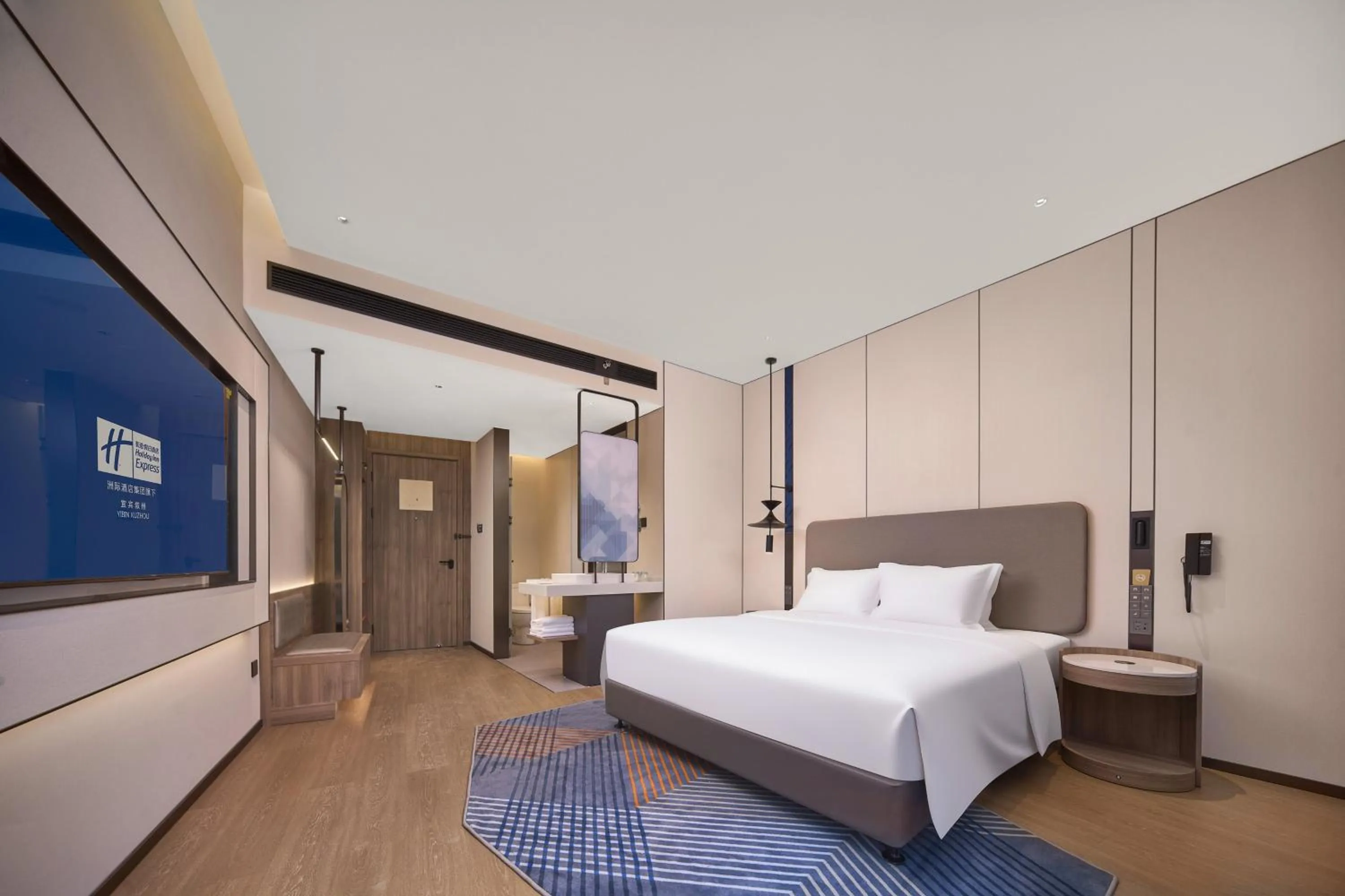 Photo of the whole room, Bed in Holiday Inn Express Yibin Xuzhou by IHG