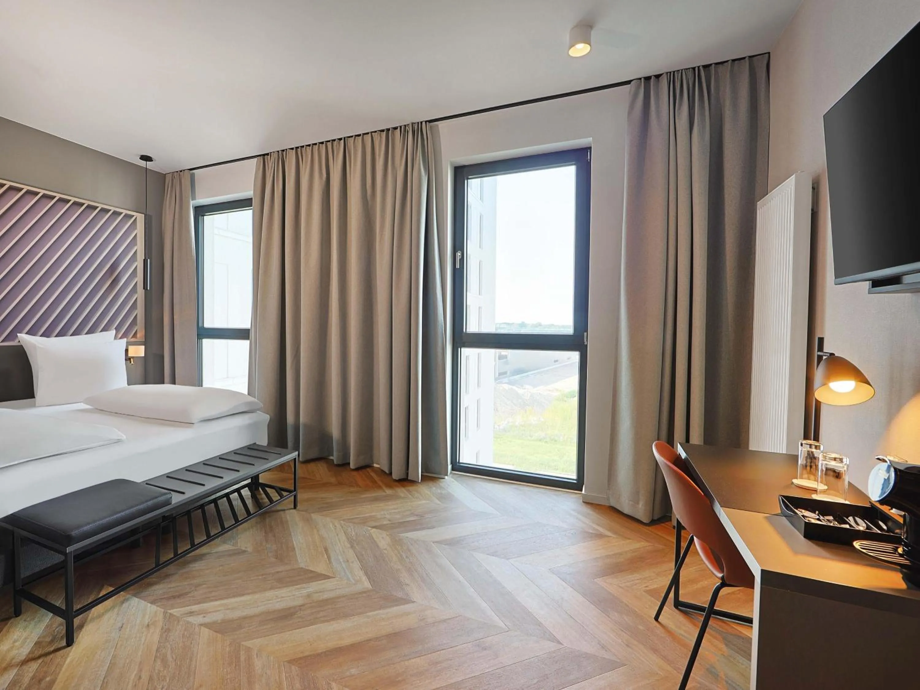 Photo of the whole room, Bed in B&B HOTEL Berlin Airport-Nord