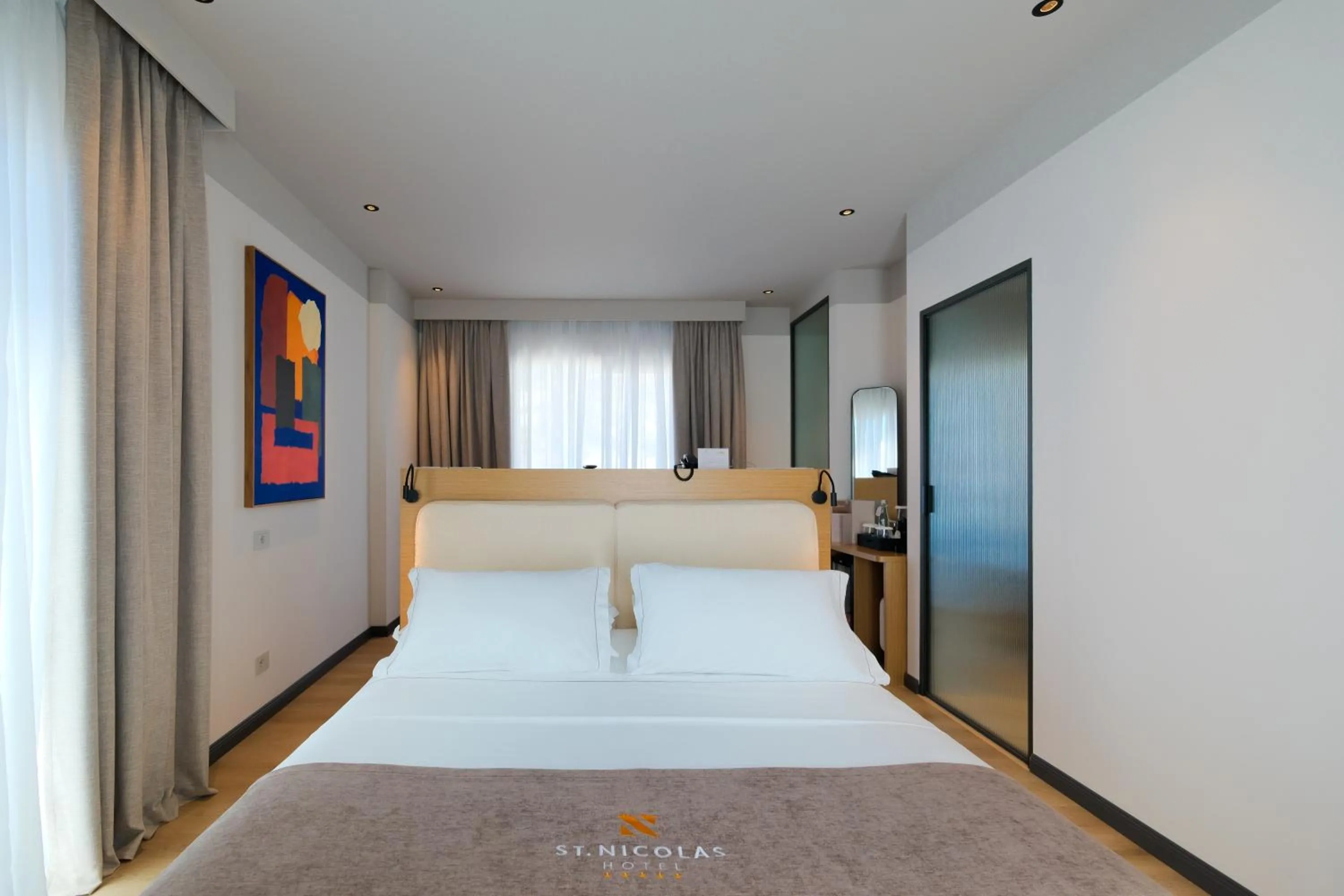 Bed in Saint Nicolas Hotel