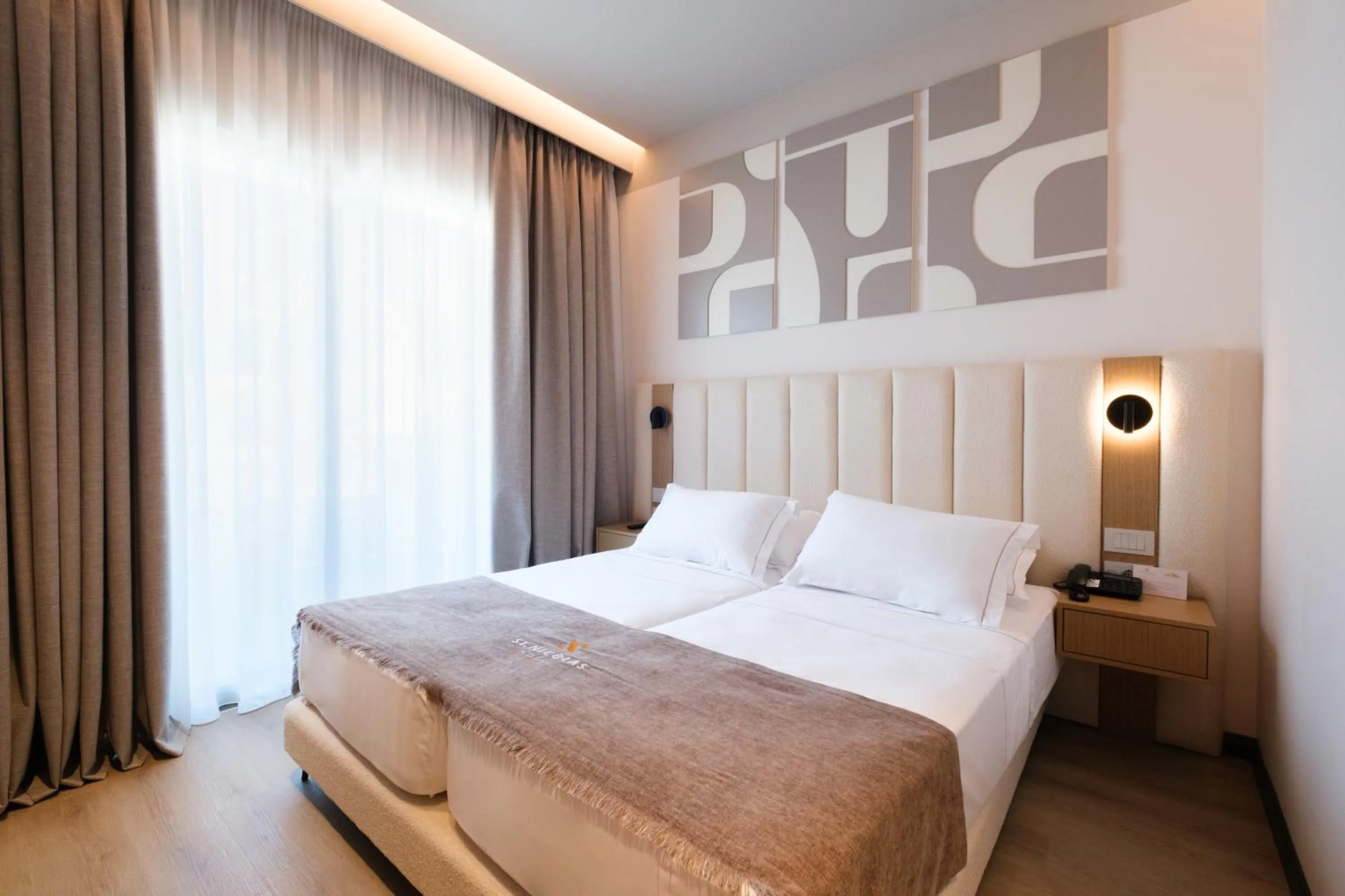 Bed in Saint Nicolas Hotel