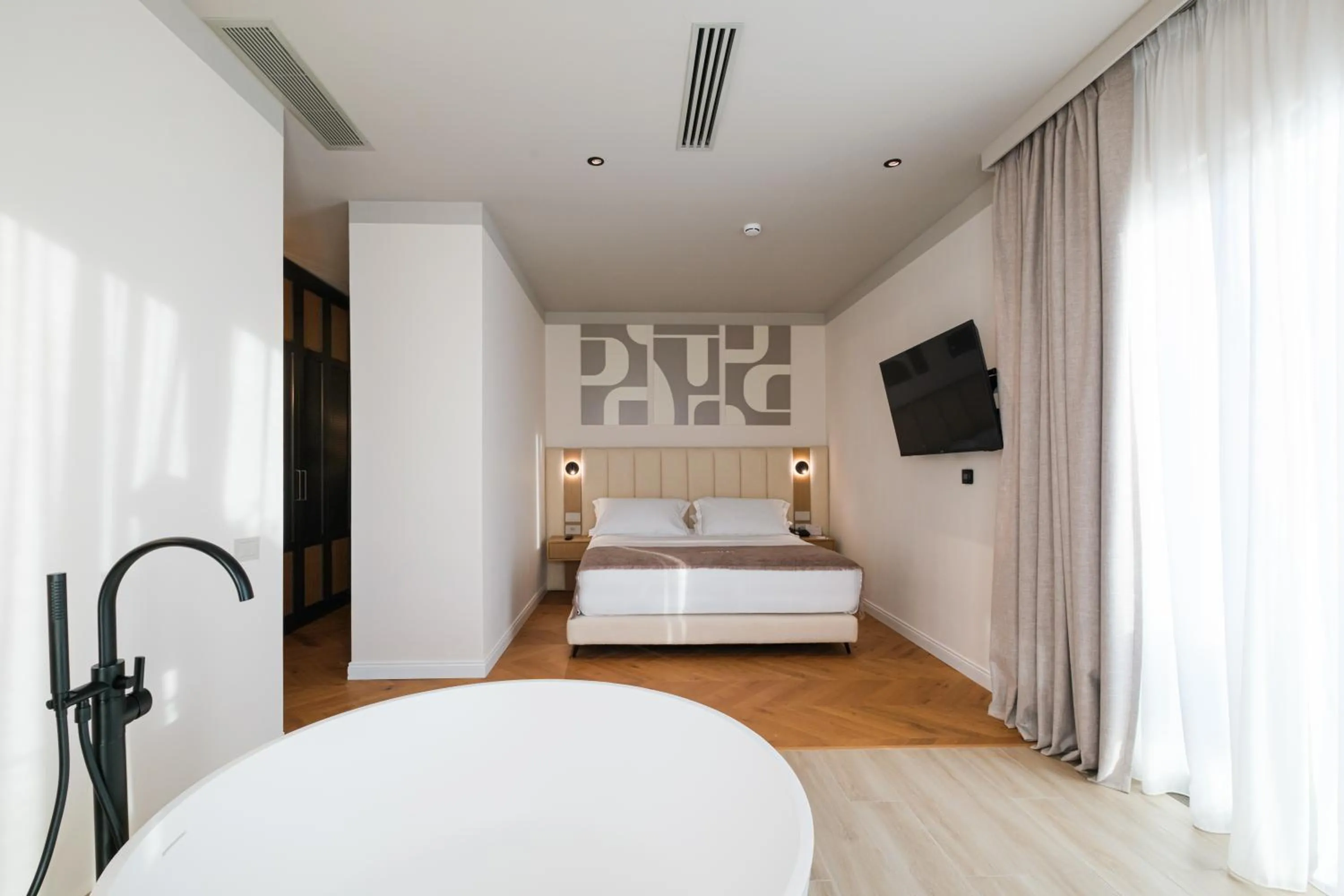 Bed in Saint Nicolas Hotel