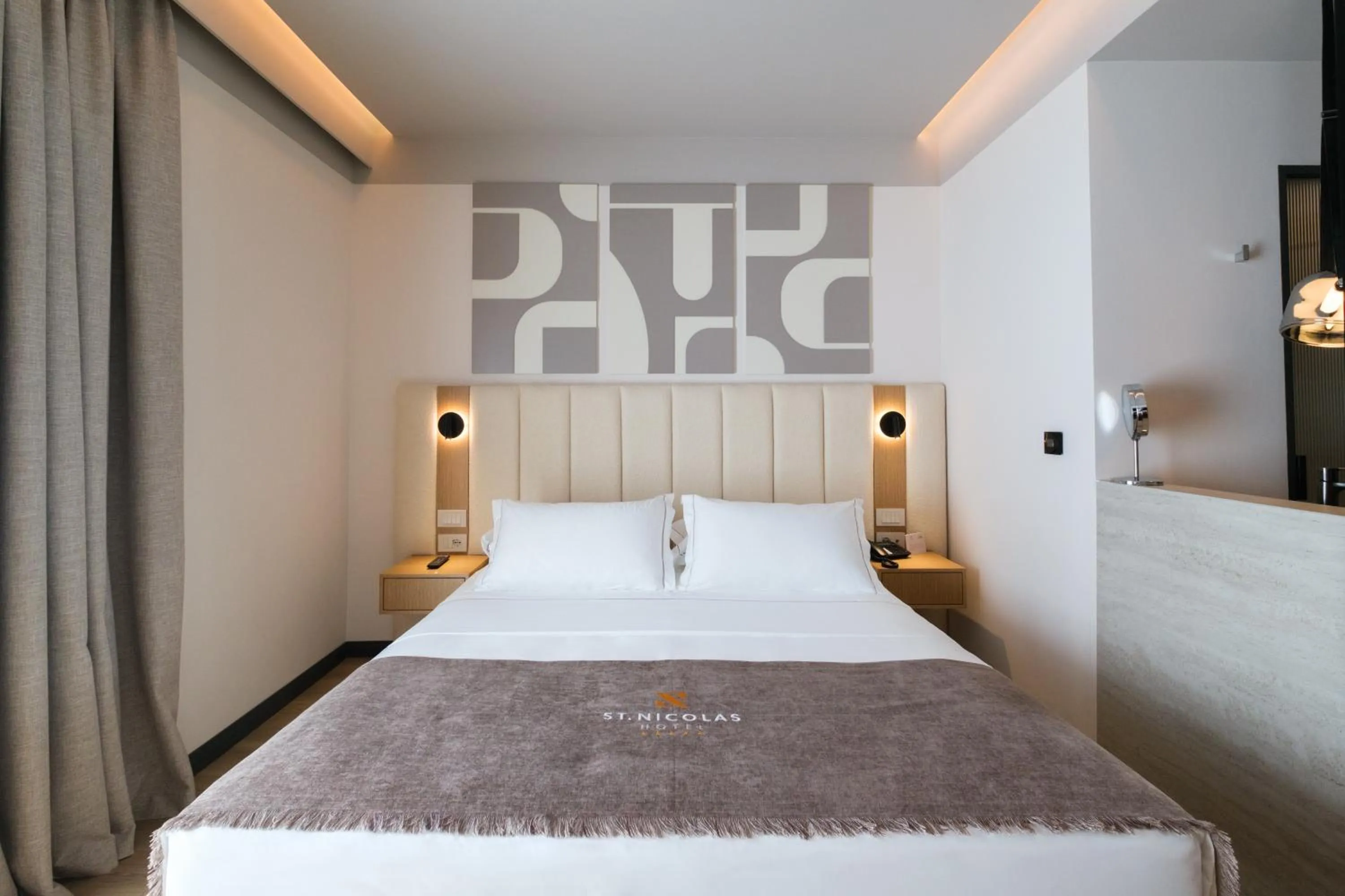 Bed in Saint Nicolas Hotel