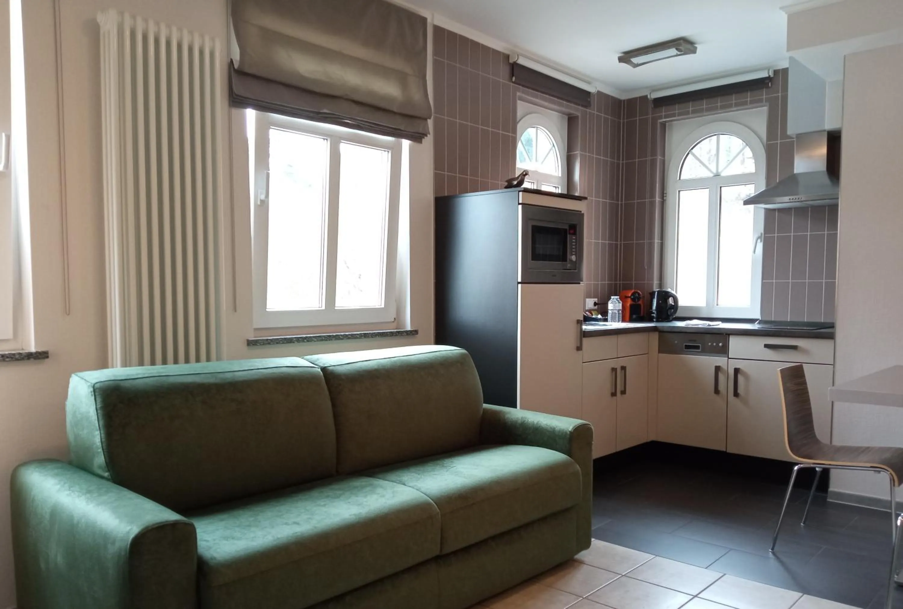 Kitchen or kitchenette in Appart-Hotel Gwendy