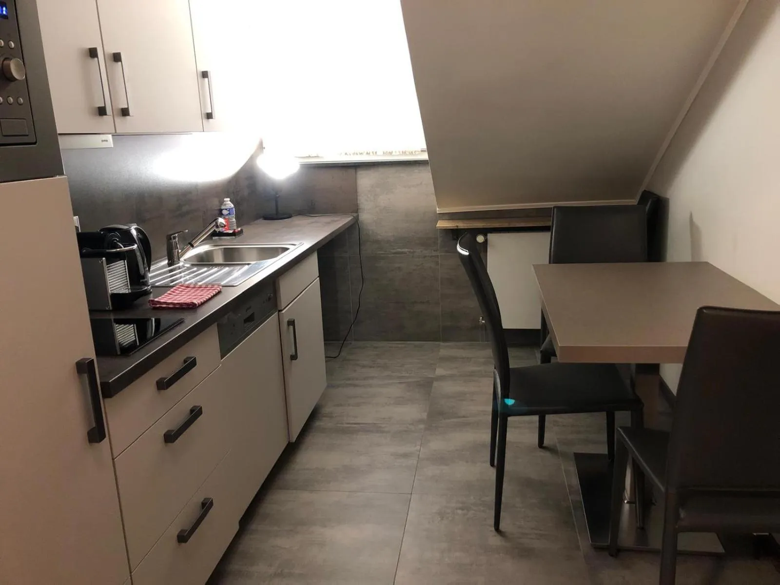 Kitchen or kitchenette in Appart-Hotel Gwendy