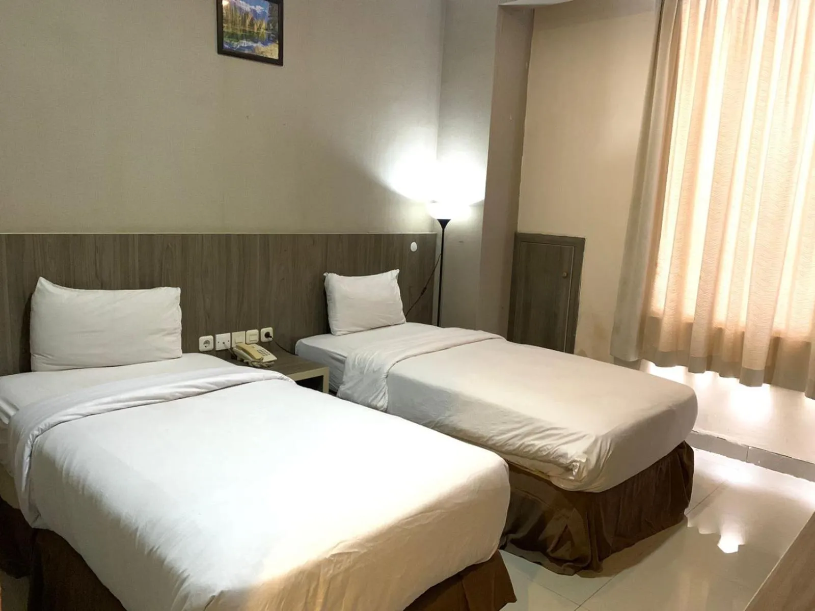 Bed in Lynt Hotel Makassar
