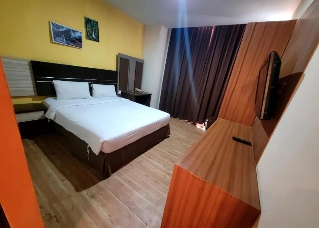 Bed in Lynt Hotel Makassar