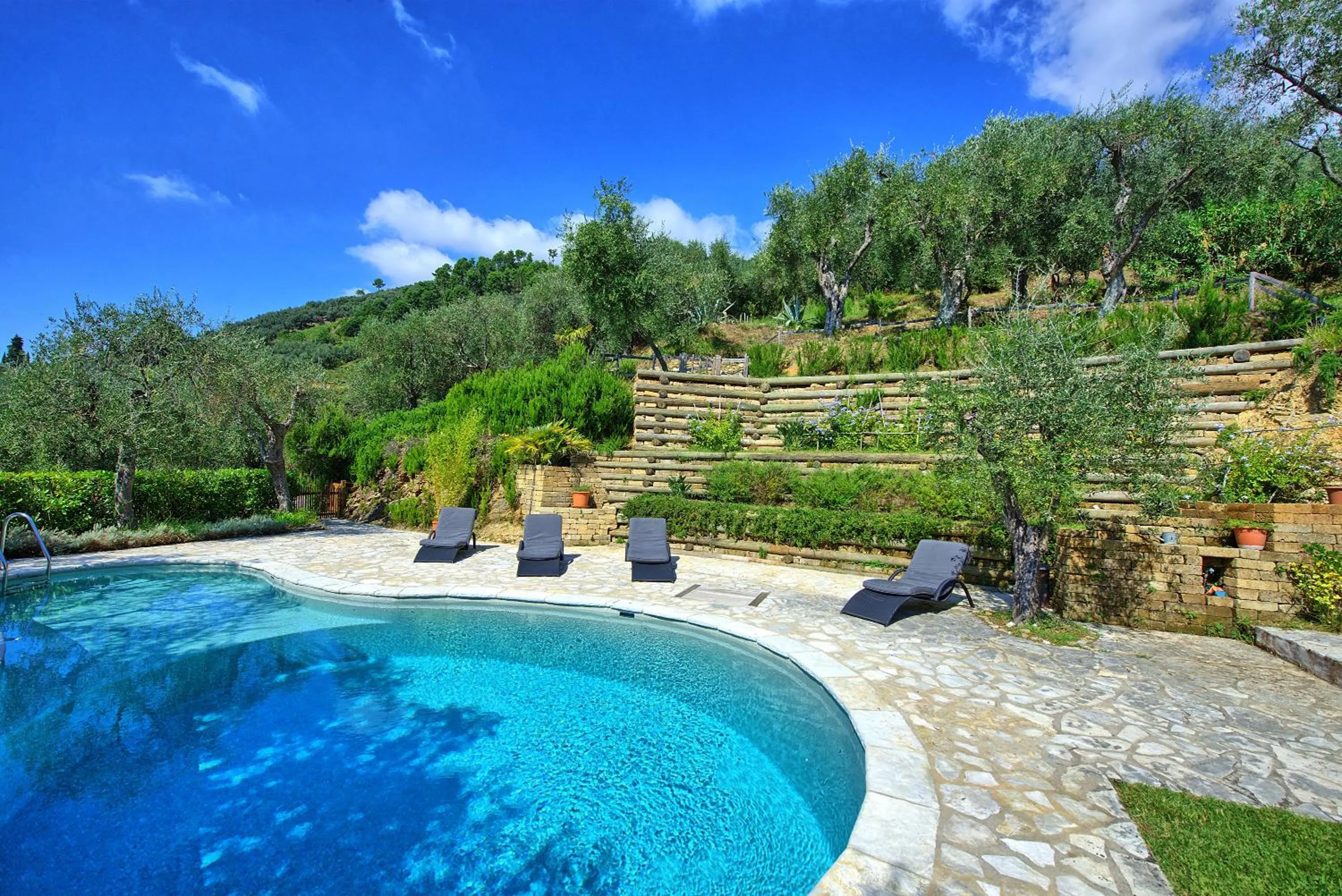 Garden in Villa Oliveta by PosarelliVillas