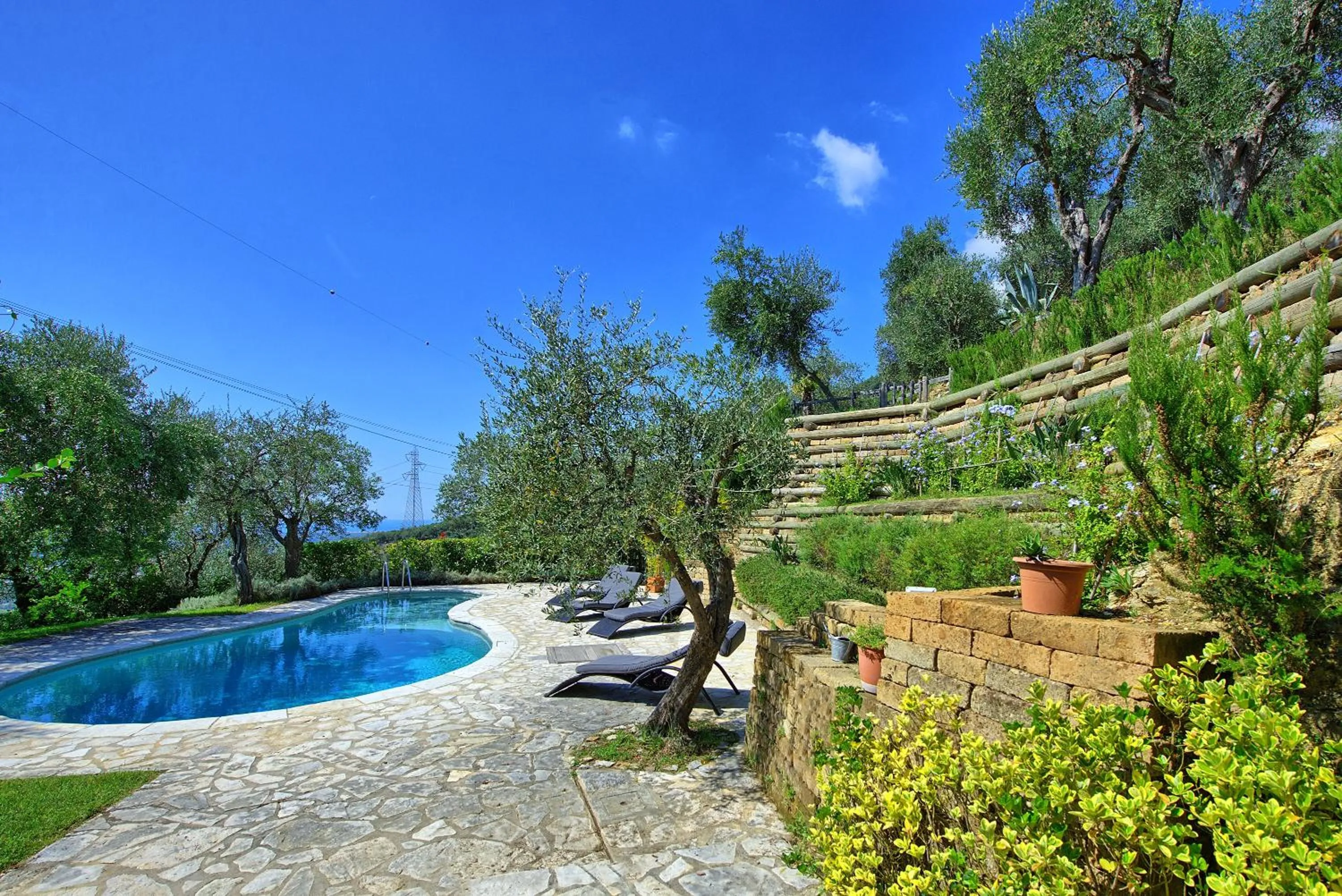 Garden in Villa Oliveta by PosarelliVillas