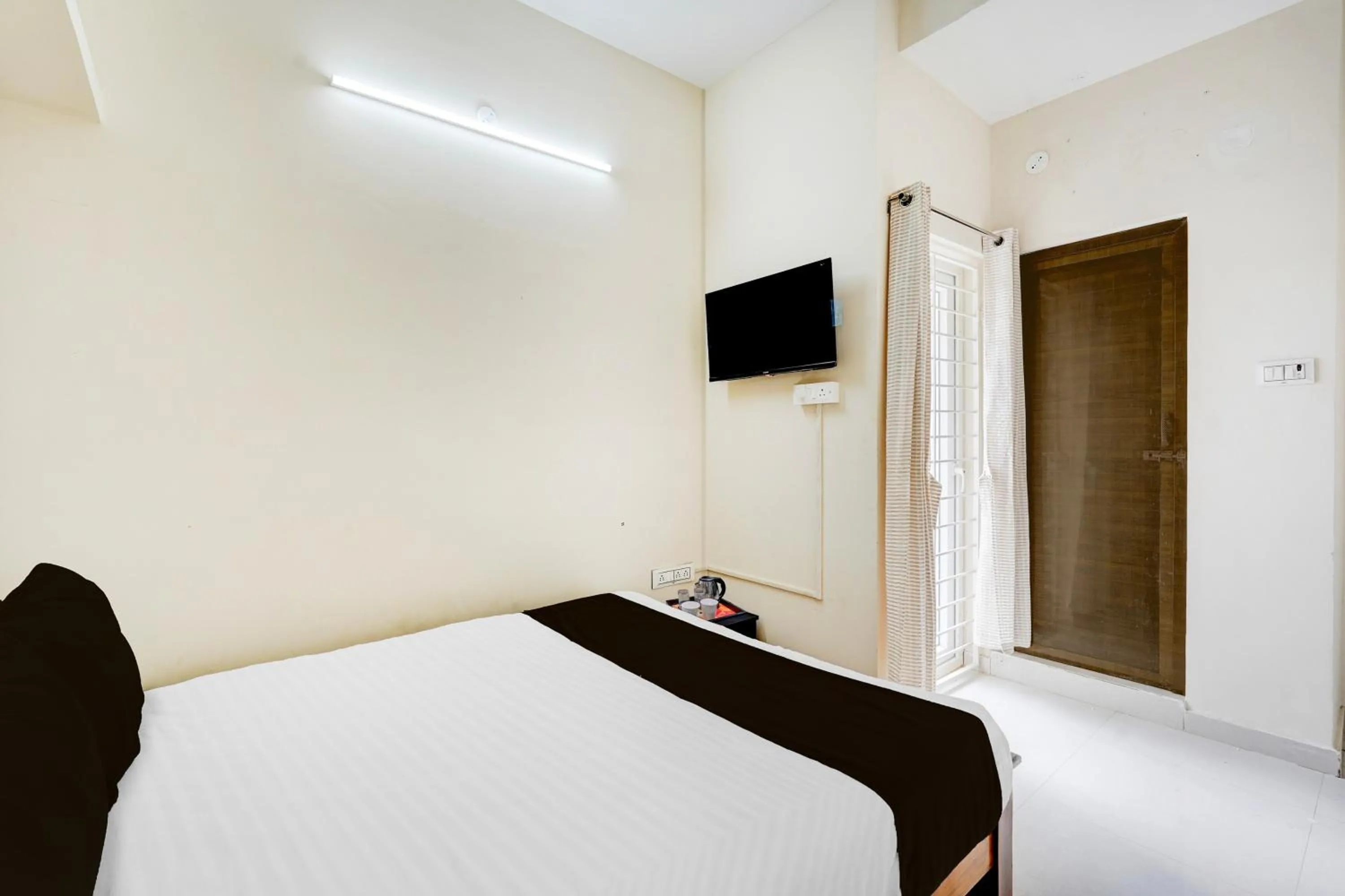 Bedroom in Super Collection O Sholinganallur Chennai Formerly Nimalan Residenc